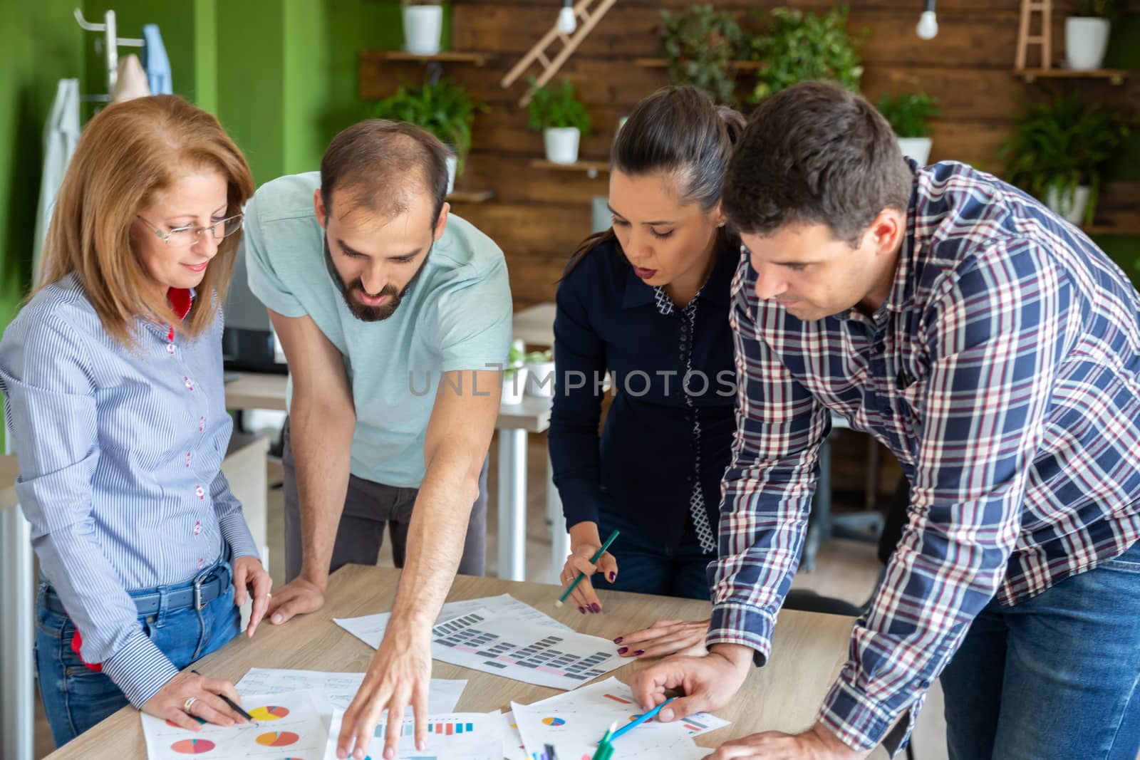 Caucasian team talk new partnership in modern start-up company.Teamwork and success