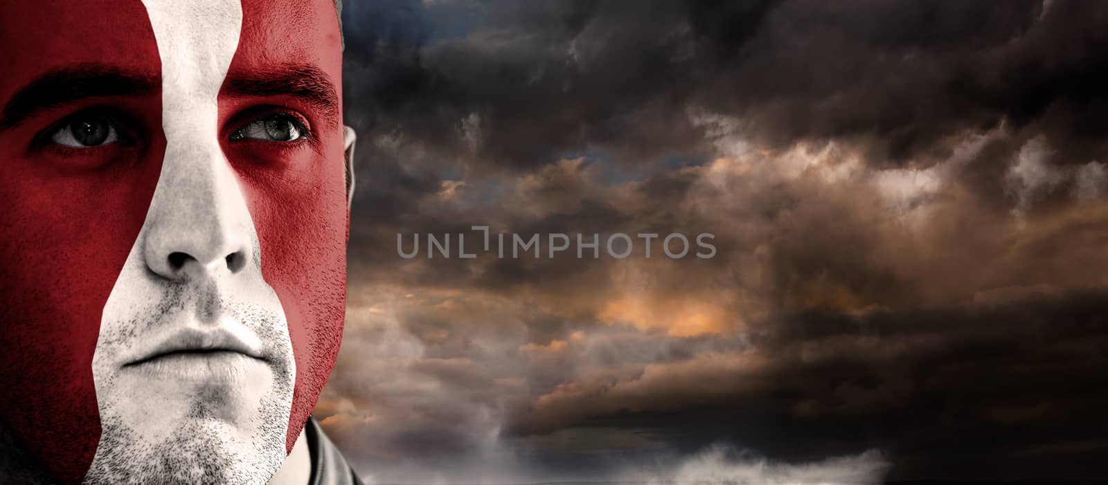 Georgia rugby player against blue and orange sky with clouds