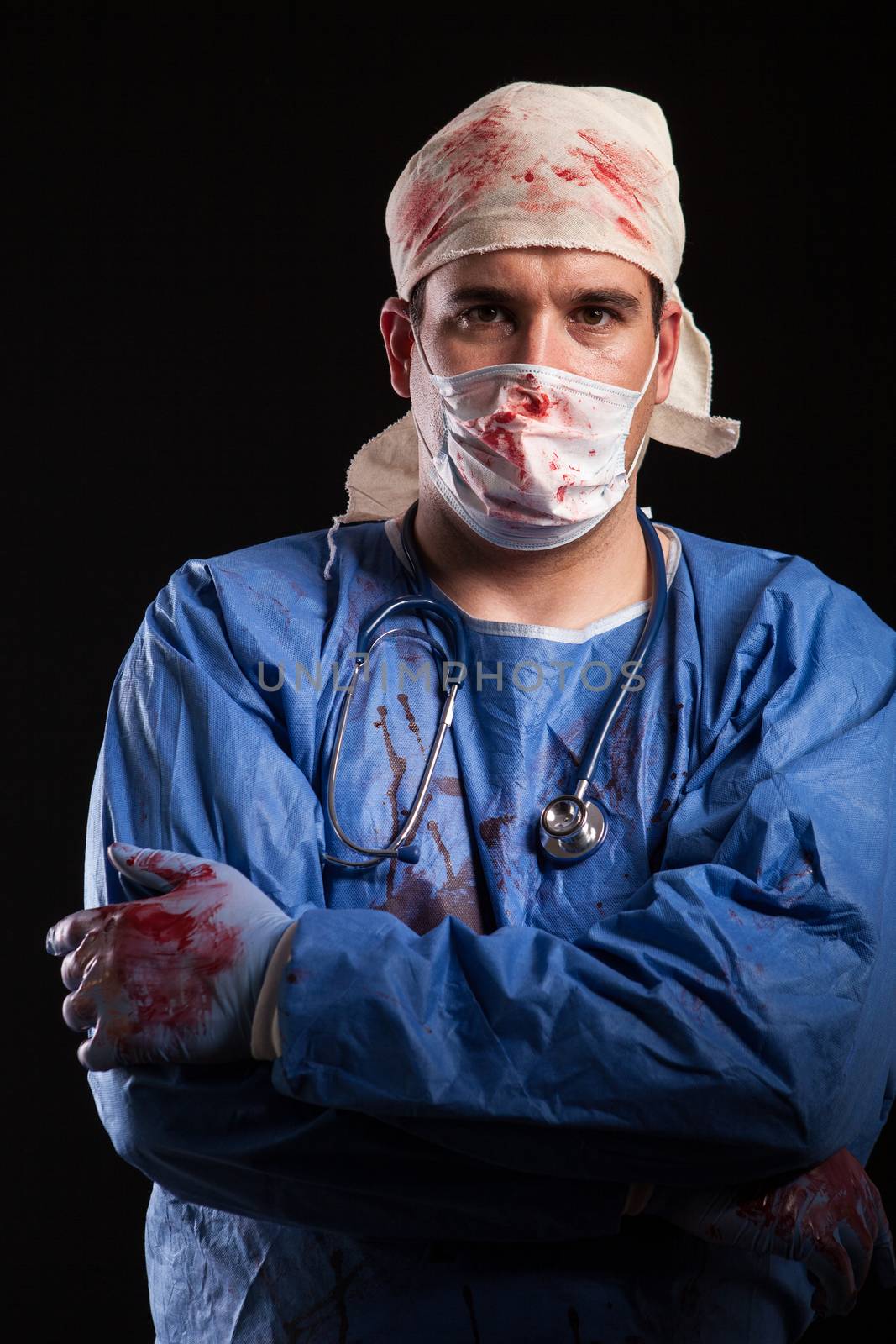 Man dressed up like a freaky doctor looking at the camera for halloween. Doctor with mental disorder.