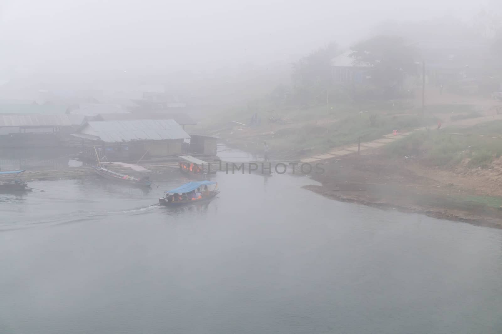 Transport people touris with boat on river with clouds in the mo by pt.pongsak@gmail.com