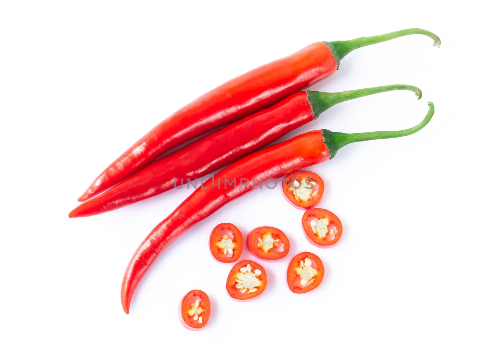 Red chili pepper sliced on white background, raw food ingredient by pt.pongsak@gmail.com