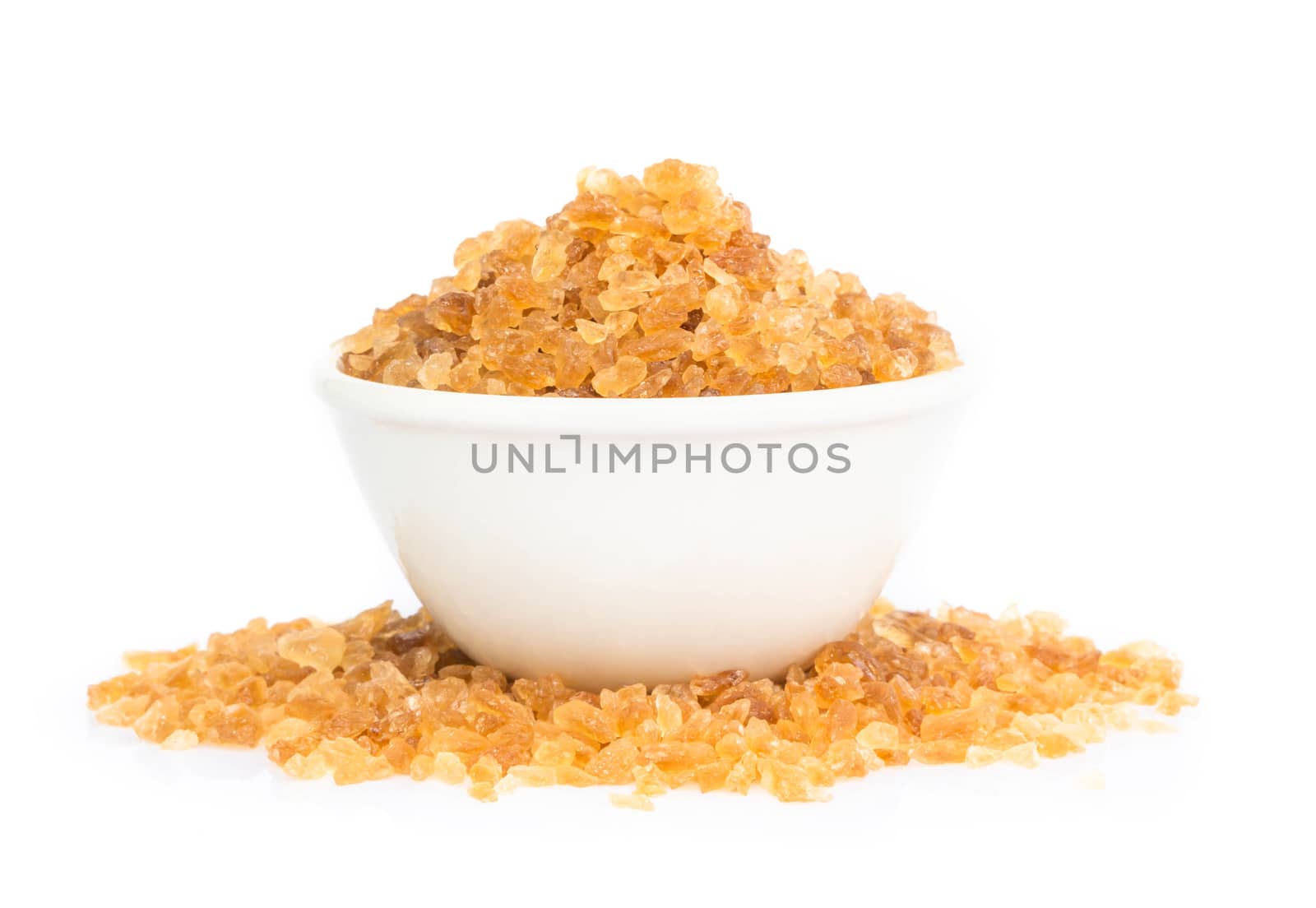 Brown sugar isolated on ceramic bowl on white background by pt.pongsak@gmail.com