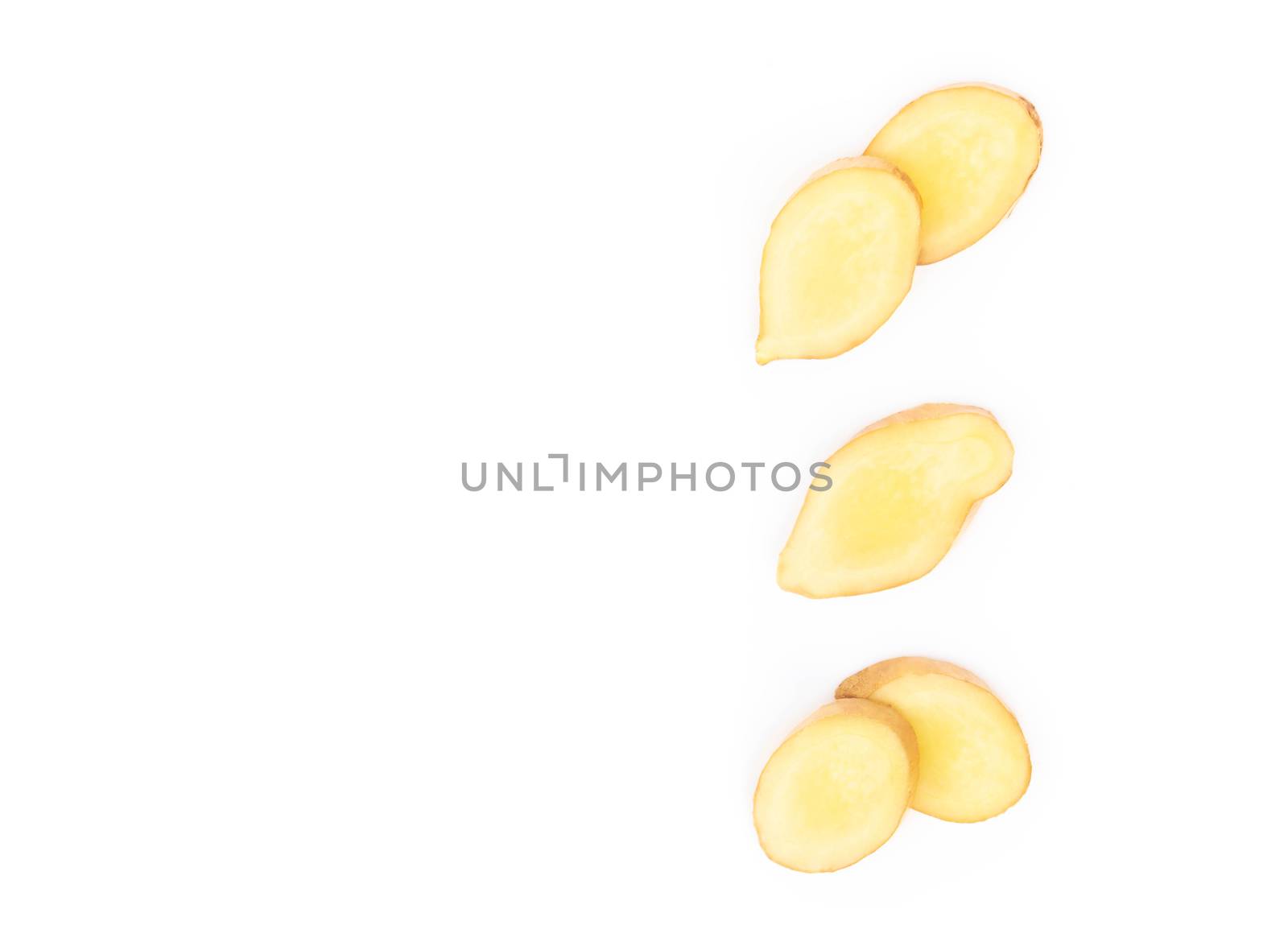 Ginger root  sliced on white background for herb and medical pro by pt.pongsak@gmail.com