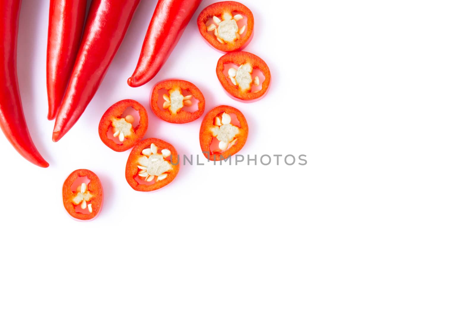Red chili pepper sliced on white background, raw food ingredient concept