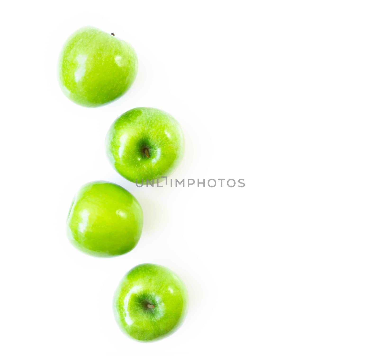 Closeup top view green apple on white background, fruit for healthy diet concept