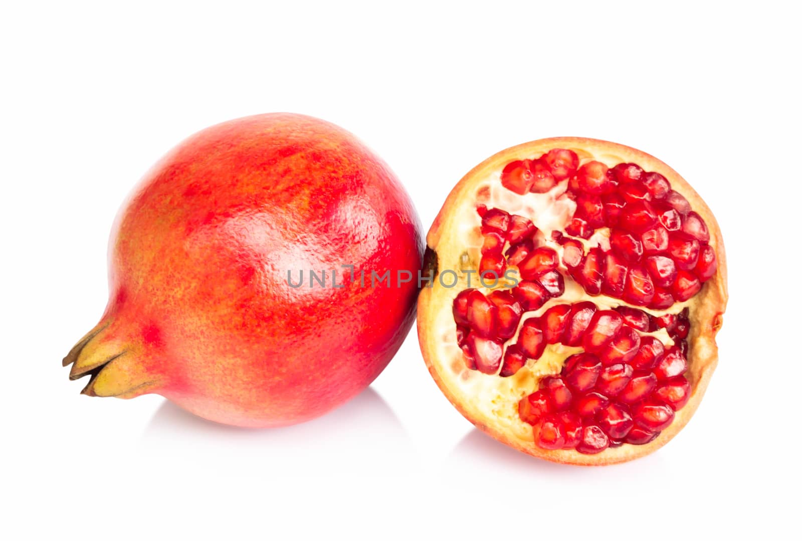 Fresh pomegranate fruit isolate on white background, healthy foo by pt.pongsak@gmail.com