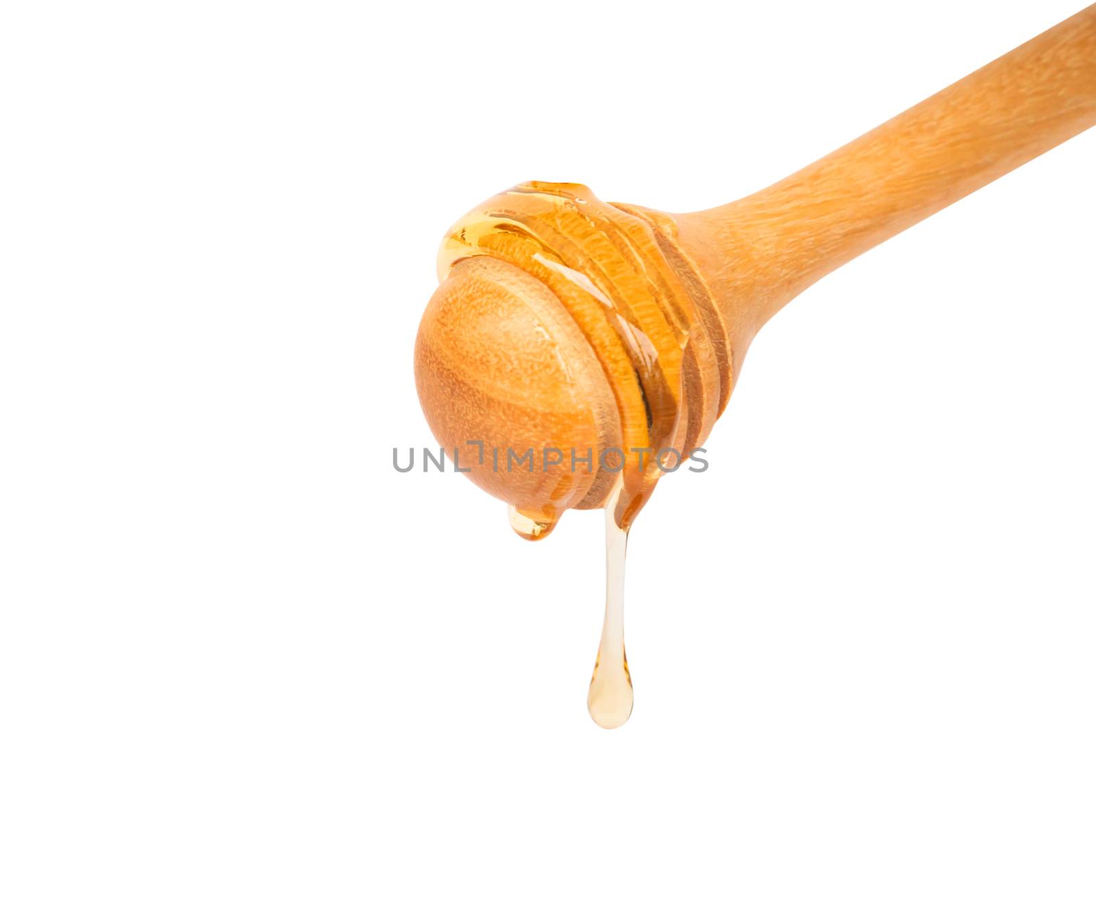 Closeup honey dripping isolated on white background, Skin care a by pt.pongsak@gmail.com