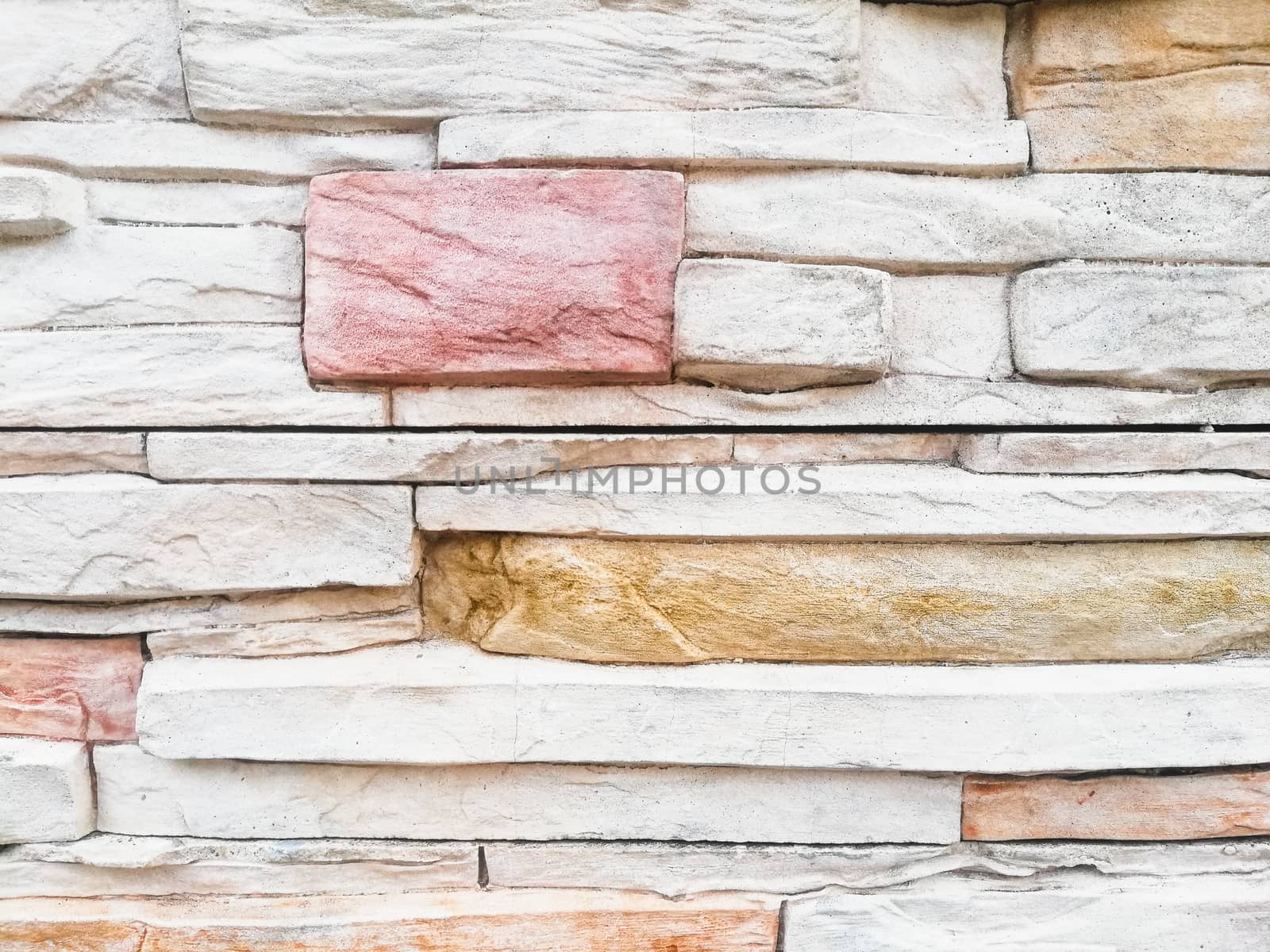 Multi-color bricks wall background by Khankeawsanan