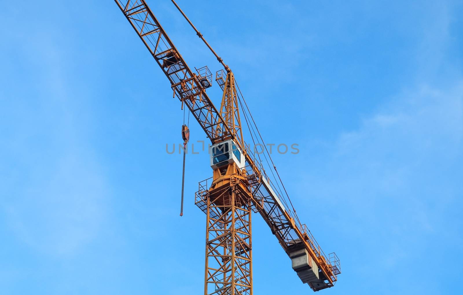 Several cranes on constructions sites at high buildings all over Europe.