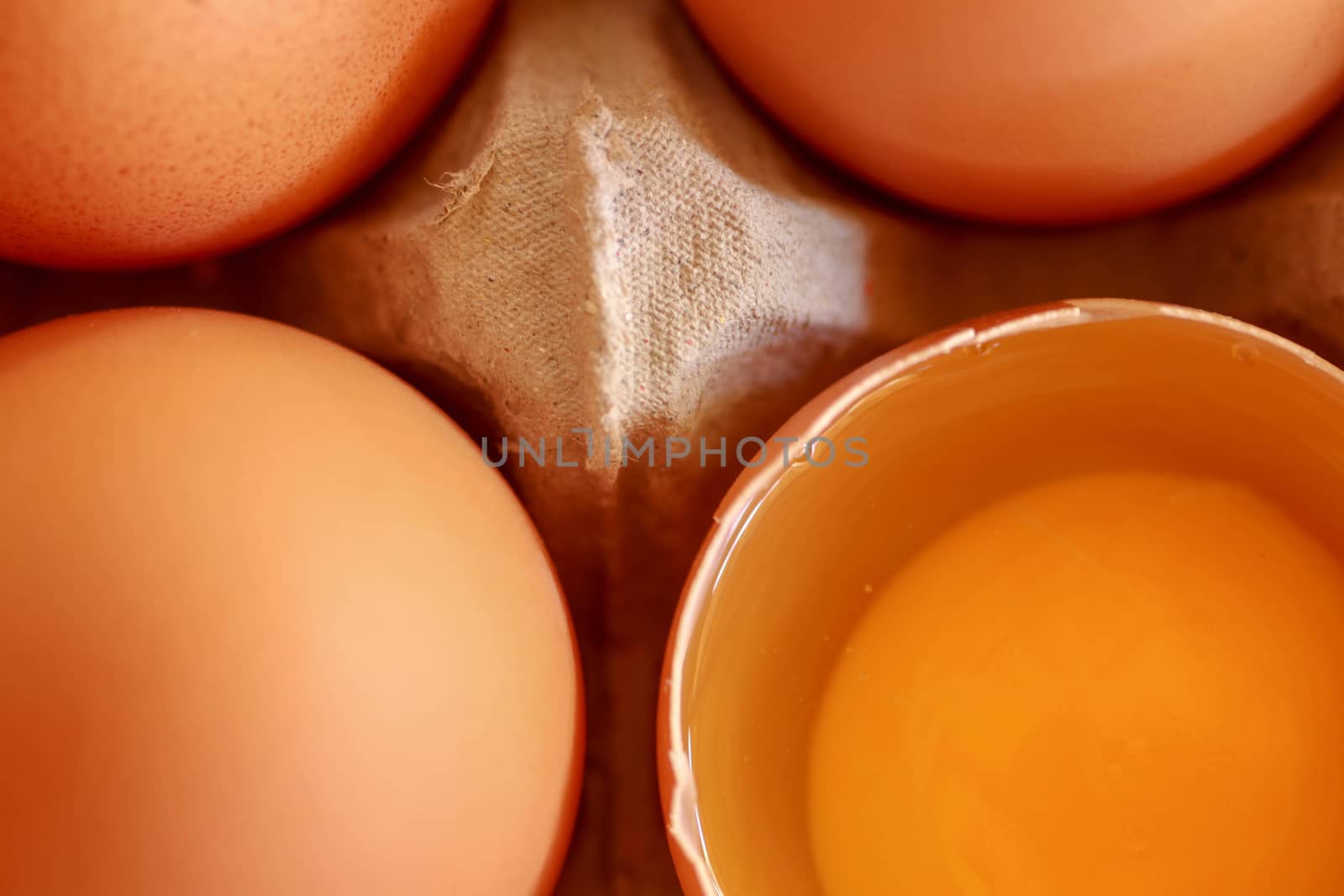 tray of raw eggs on background. Top view by Sanatana2008