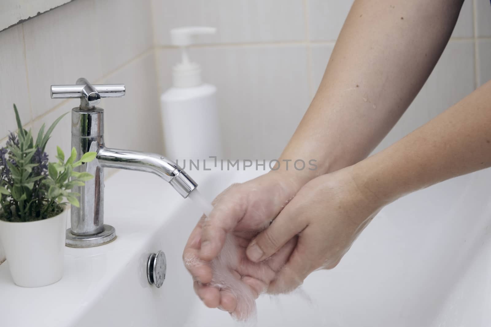 Personal hygiene, cleansing the hands. Washing hands rubbing with soap man for corona virus prevention, hygiene to stop spreading coronavirus.