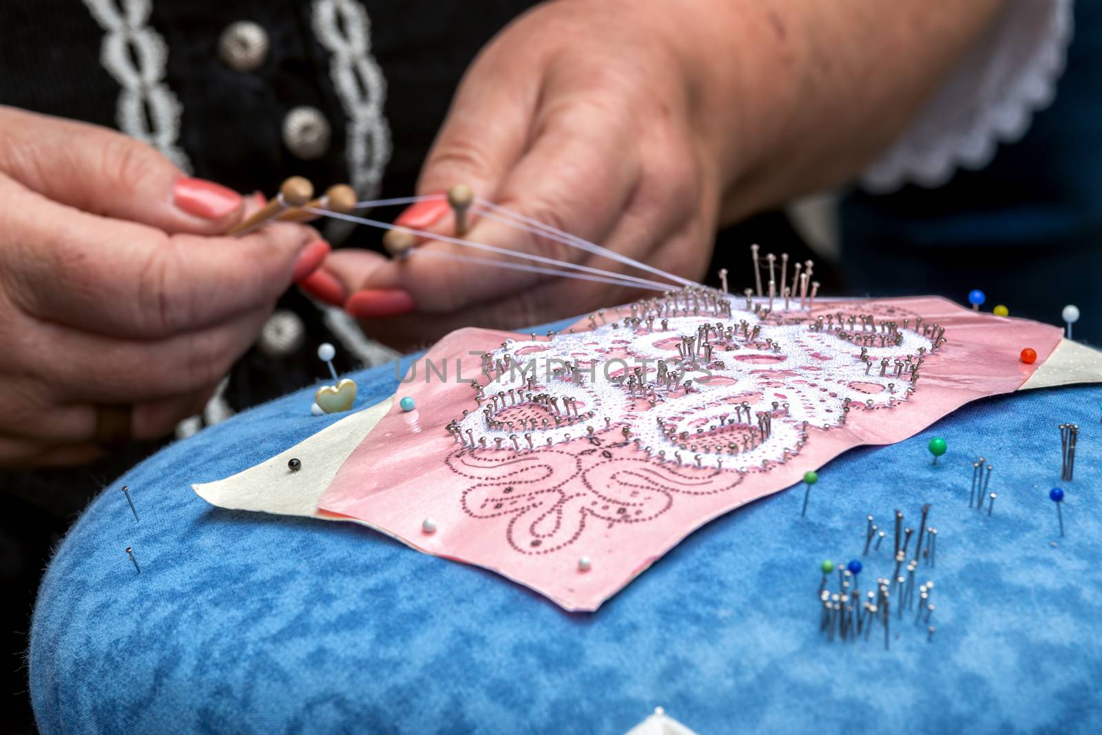 Old woman weaves,traditional culture