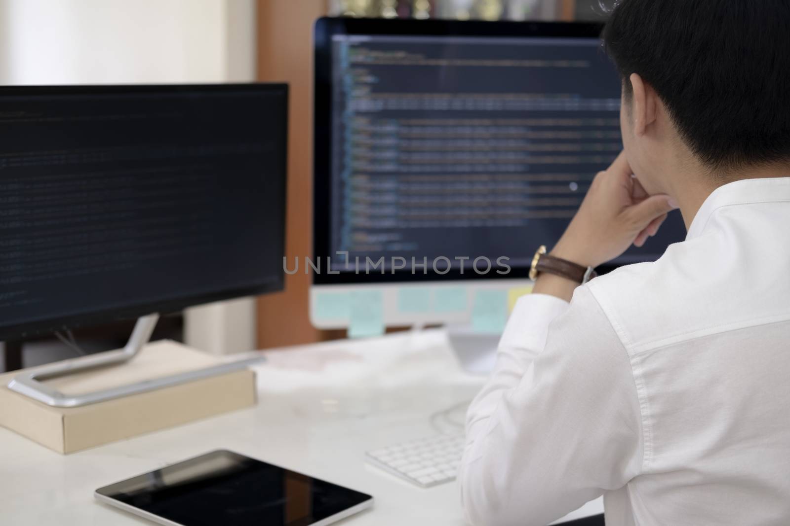 Programmer is coding and programming software. Software developer typing data code, working on project.
