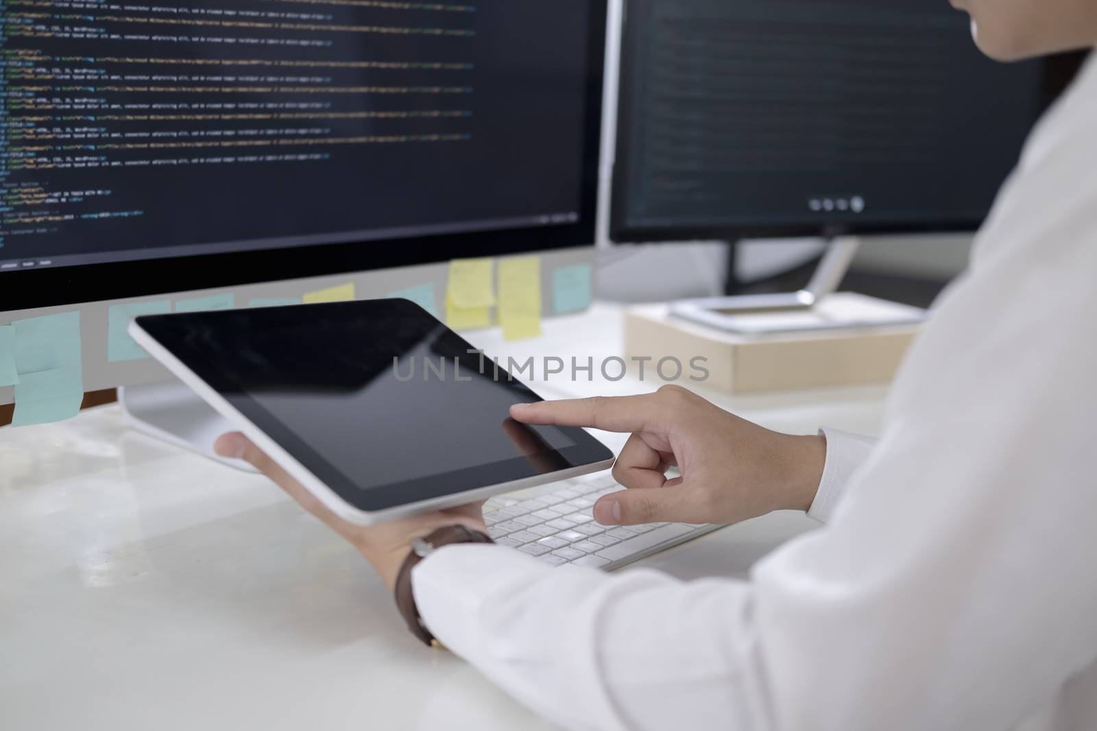 Programmer is coding and programming software. Software developer typing data code, working on project.