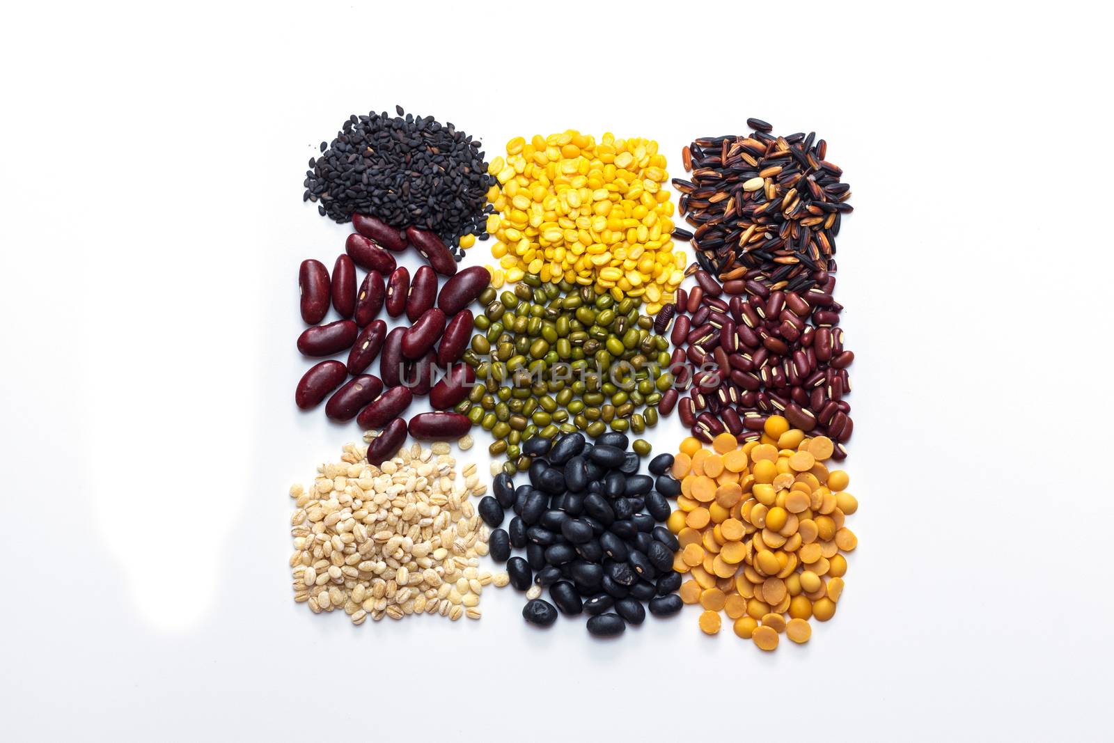 grains seeds and beans in different types and colors on white background