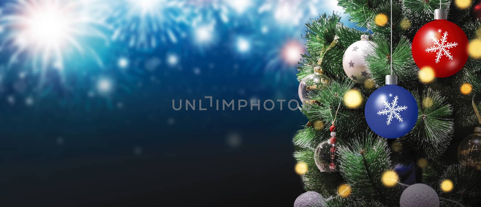 Christmas tree with bokeh light on fireworks background at night by Myimagine