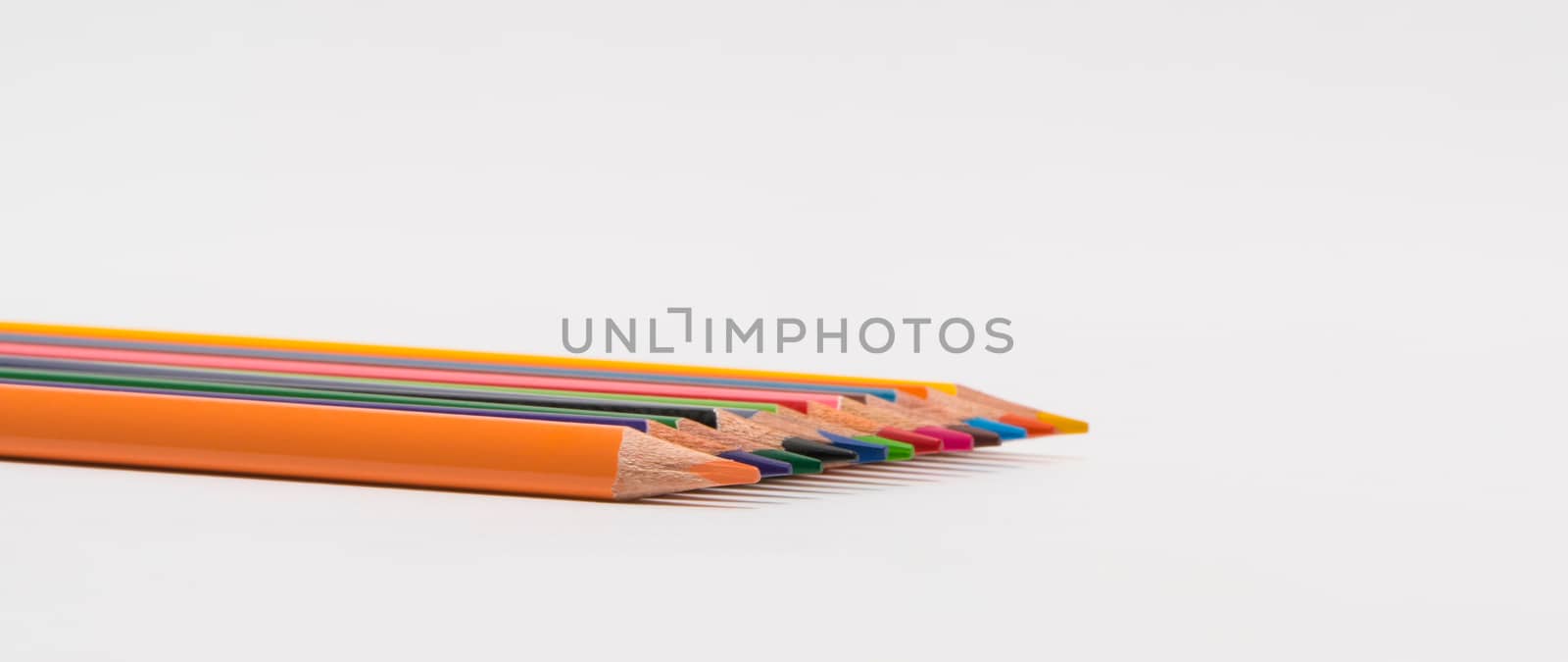 set of colored pencils on a white background, isolated. back to school
