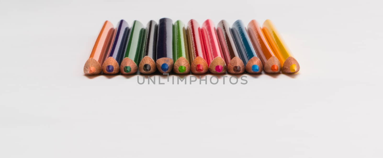 set of colored pencils on a white background, isolated. back to school