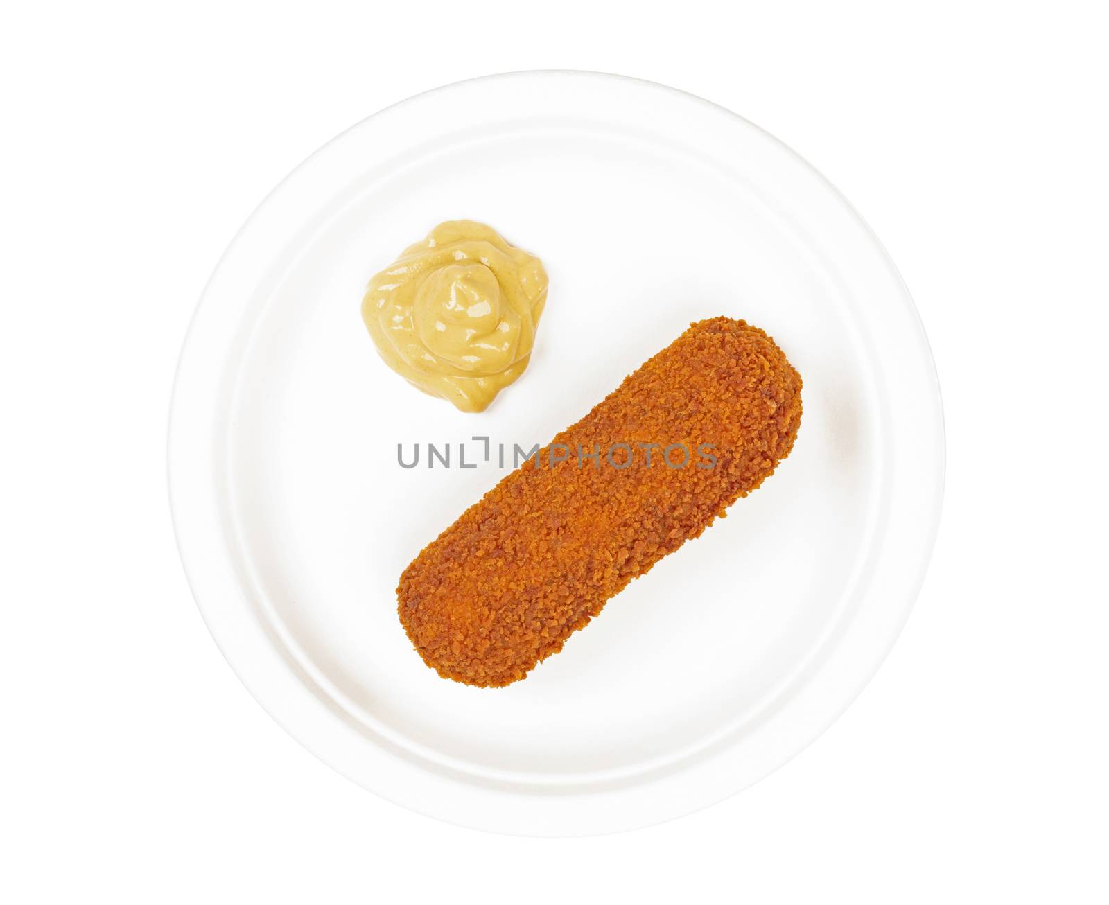 Brown crusty dutch kroket with mustard on a white plate isolated by michaklootwijk