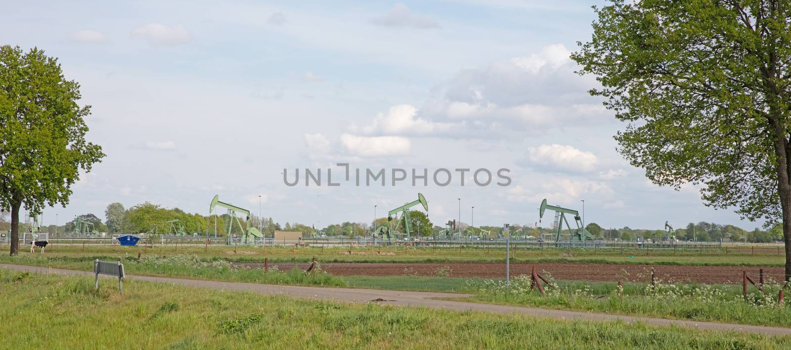 Landscape with oil pump jack by michaklootwijk