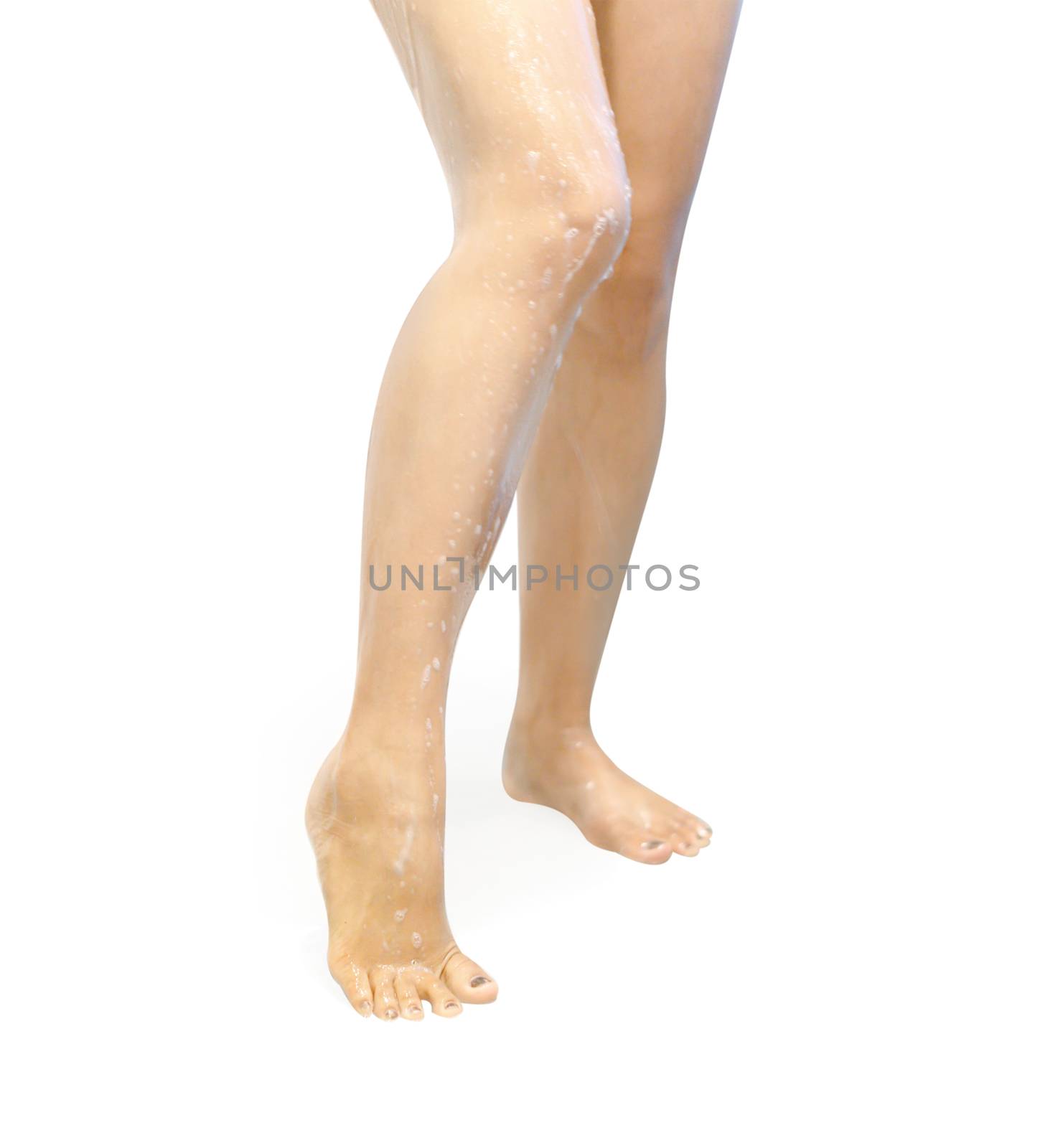 Woman legs with taking a shower isolated on white background, health care and beauty