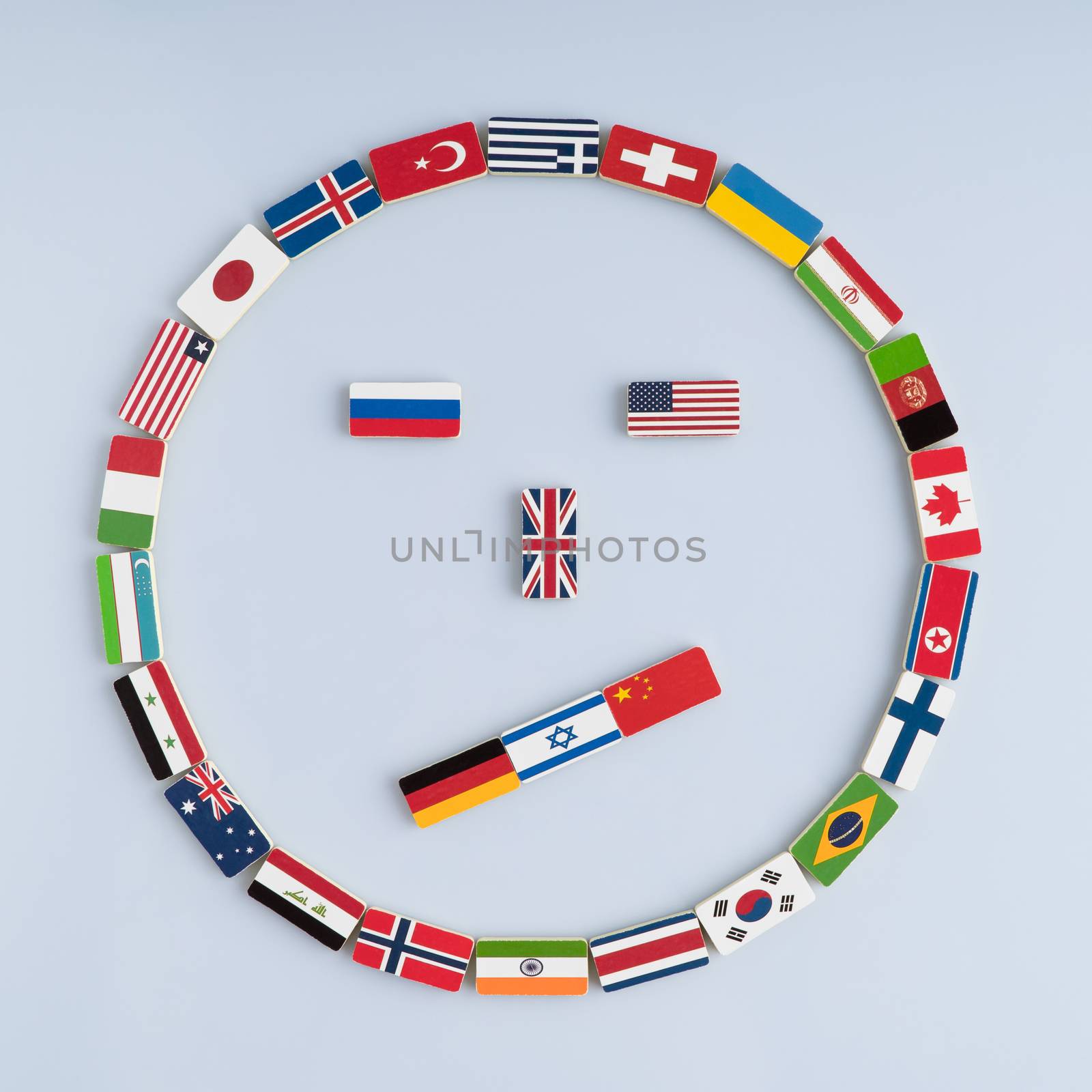 illustration of a smiley face from national flags on dominoes. Concept of peace and the Commonwealth of Nations and the world order