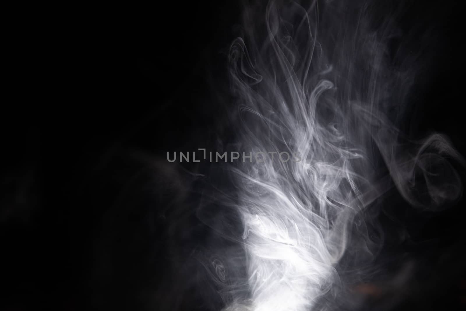 A smoke isolated on a black background - cool for wallpapers