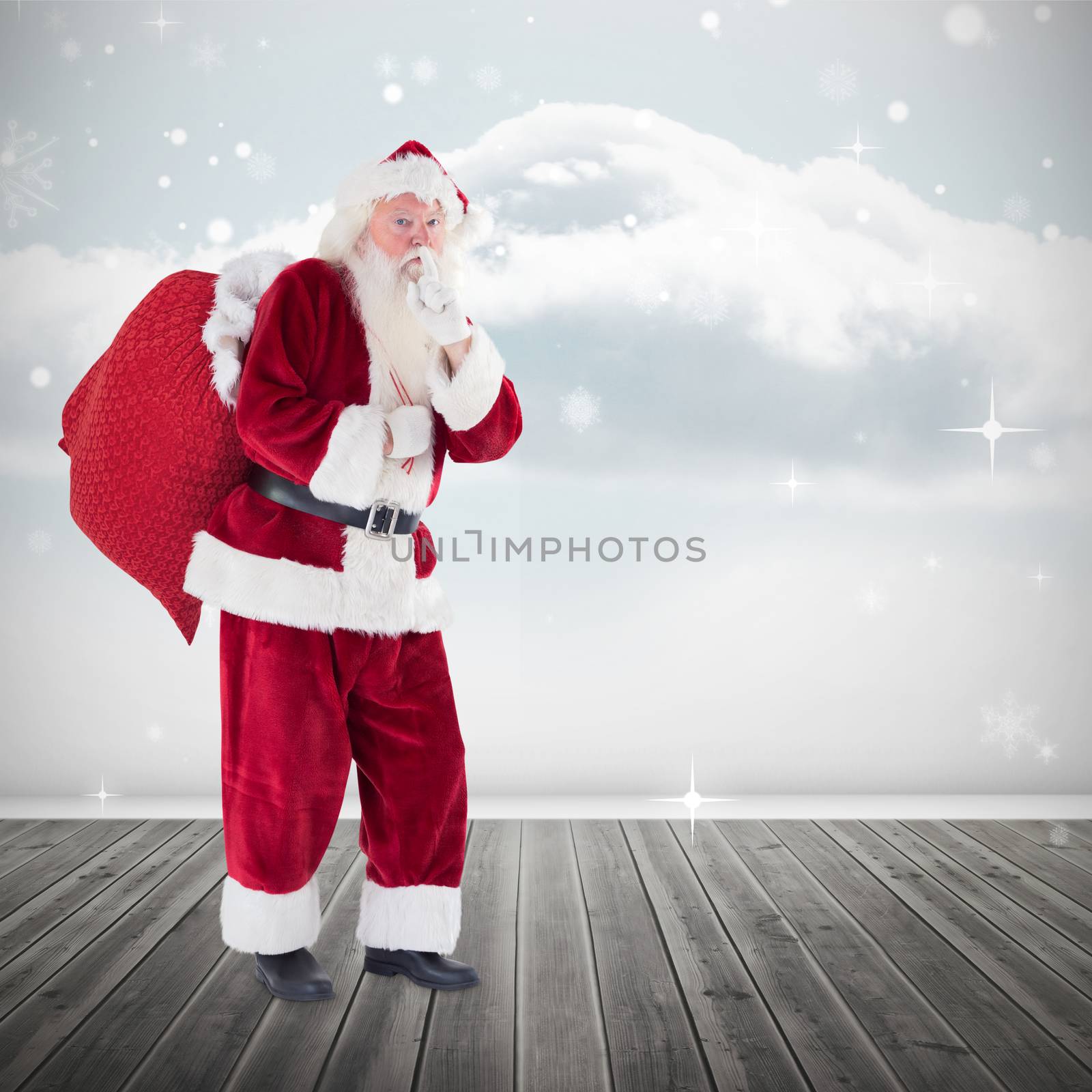 Santa keeping a secret against clouds in a room