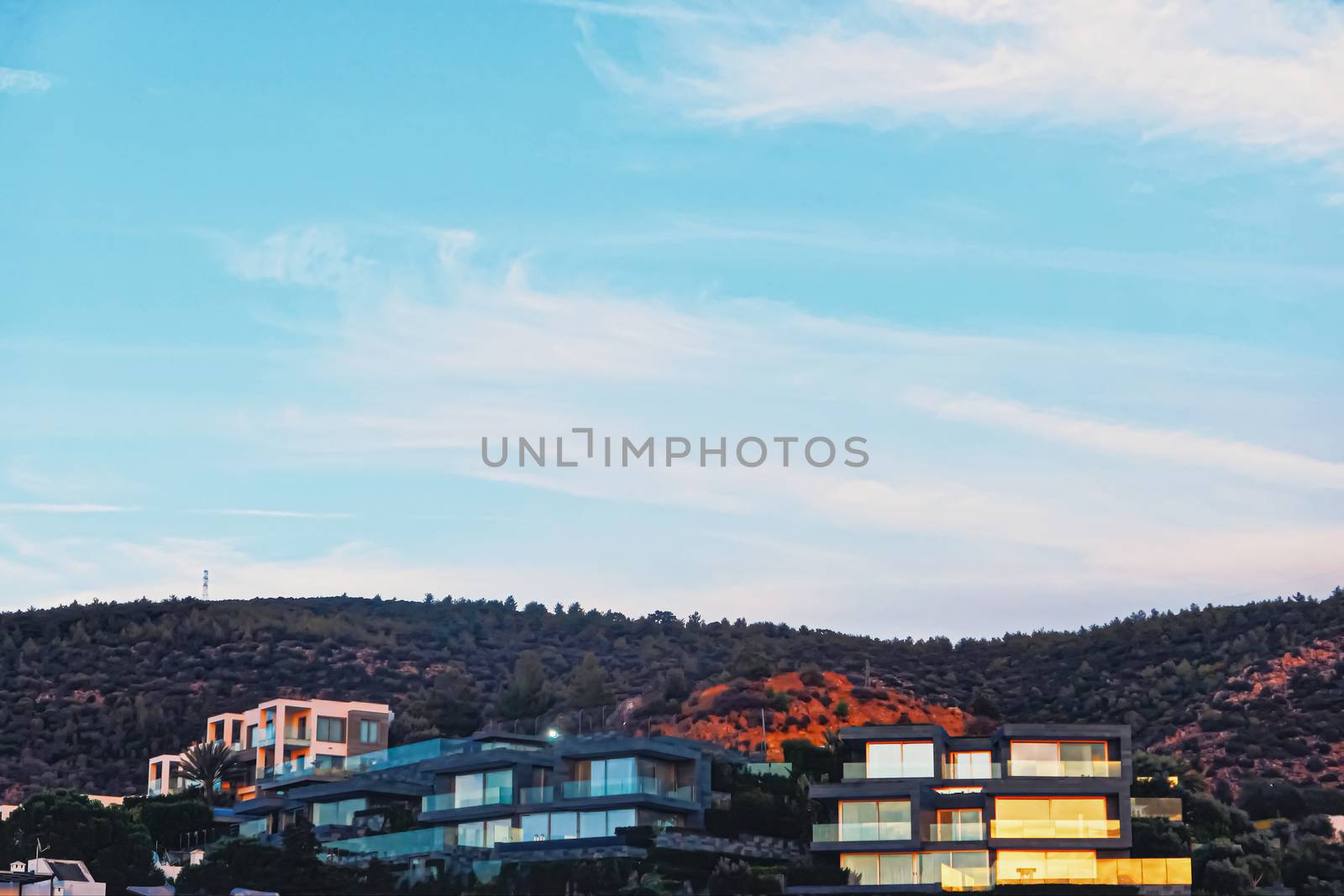 Modern house in the mountains, architecture and real estate concept