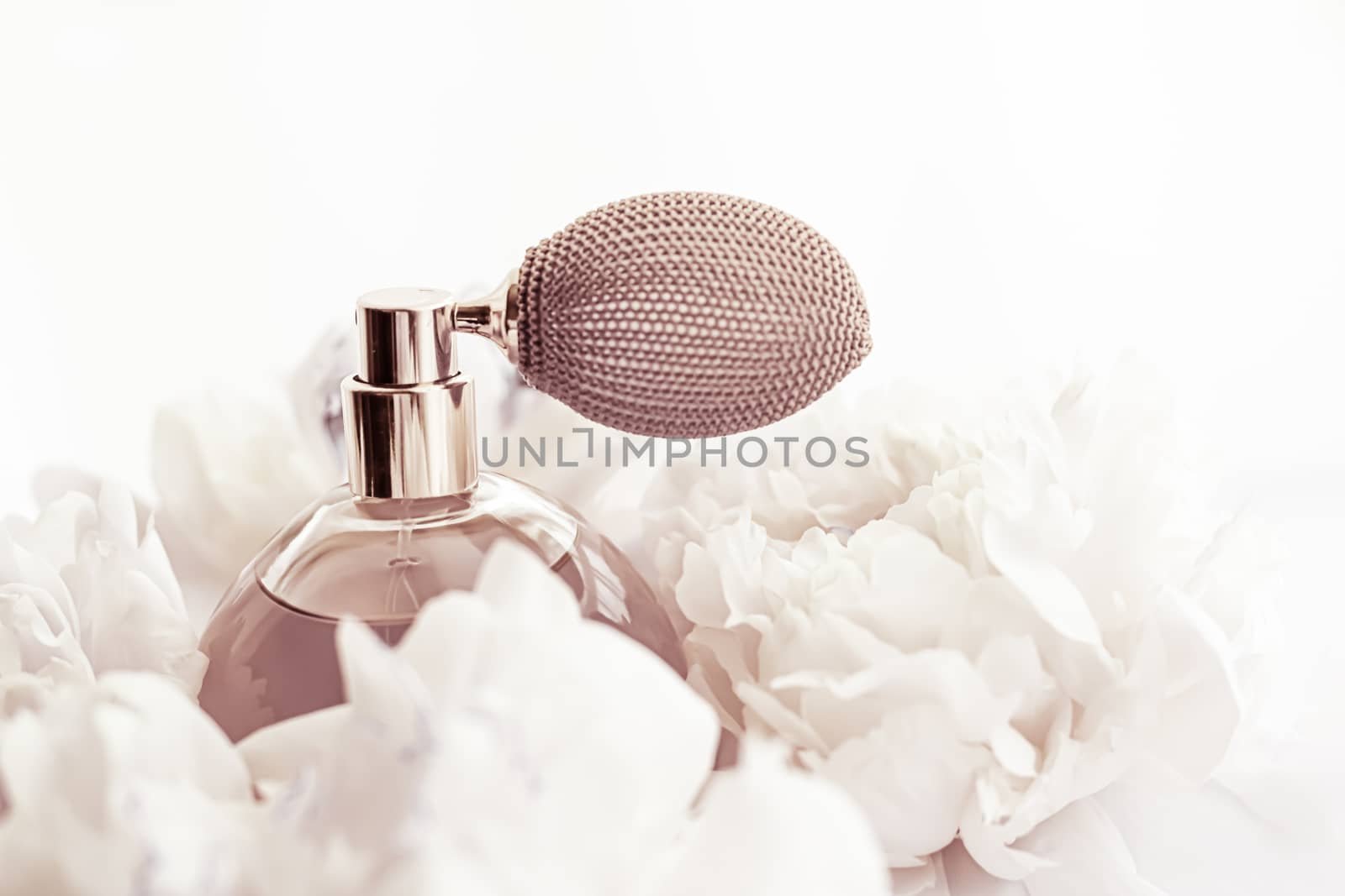 Retro fragrance bottle as luxury perfume product on background of peony flowers, parfum ad and beauty branding by Anneleven