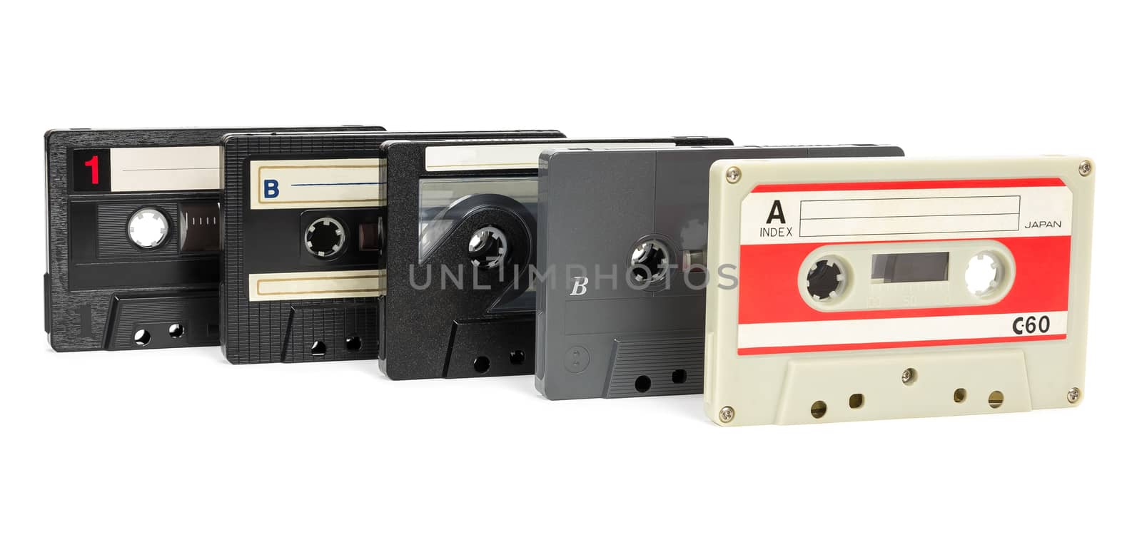 Set of vintage audio tapes on white background by mkos83