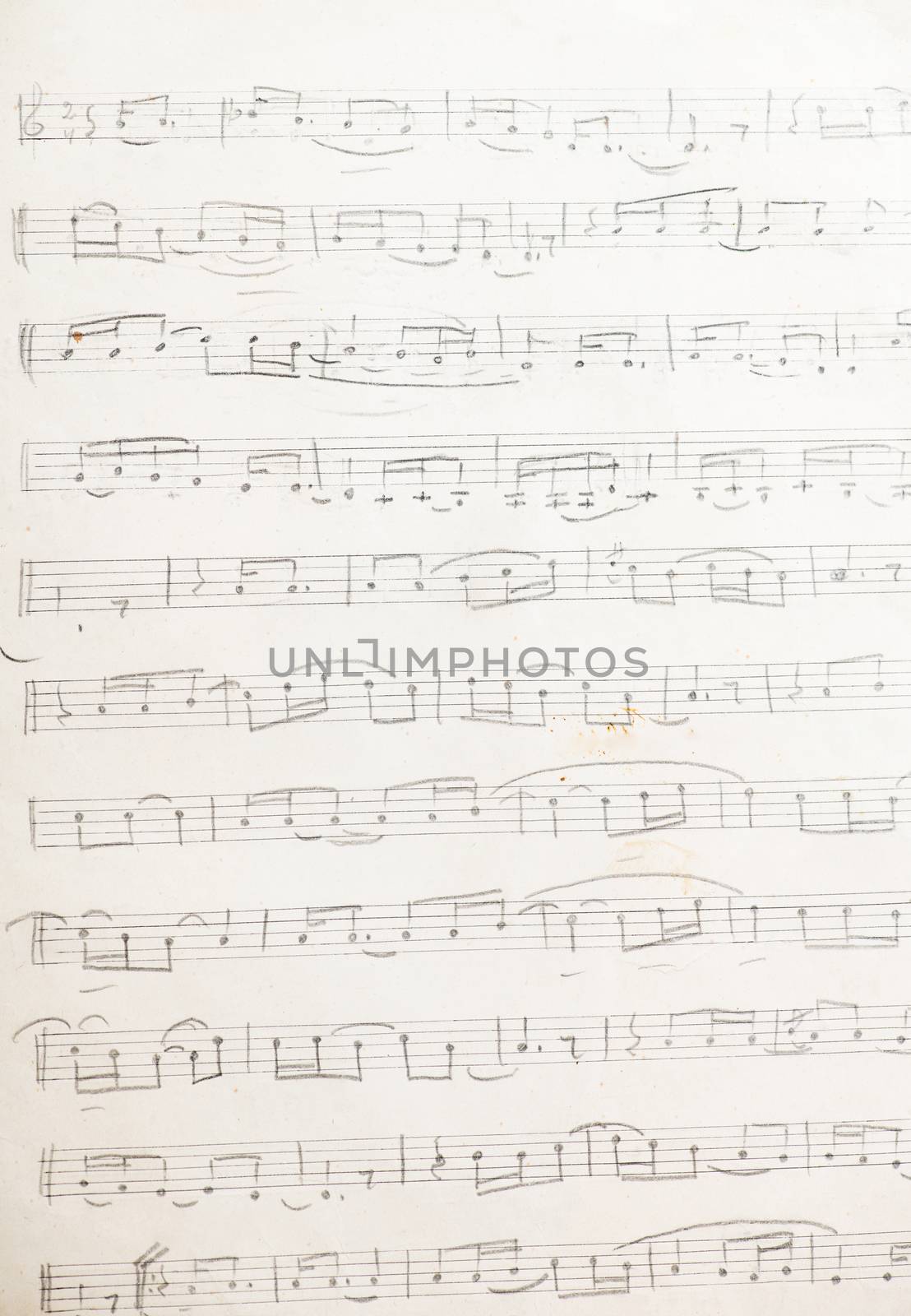 Tashkent, Uzbekistan - October 6, 2018. The work of the Uzbek folk composer Yunus Rajabi. Vintage sheet of paper with handwritten musical notes.