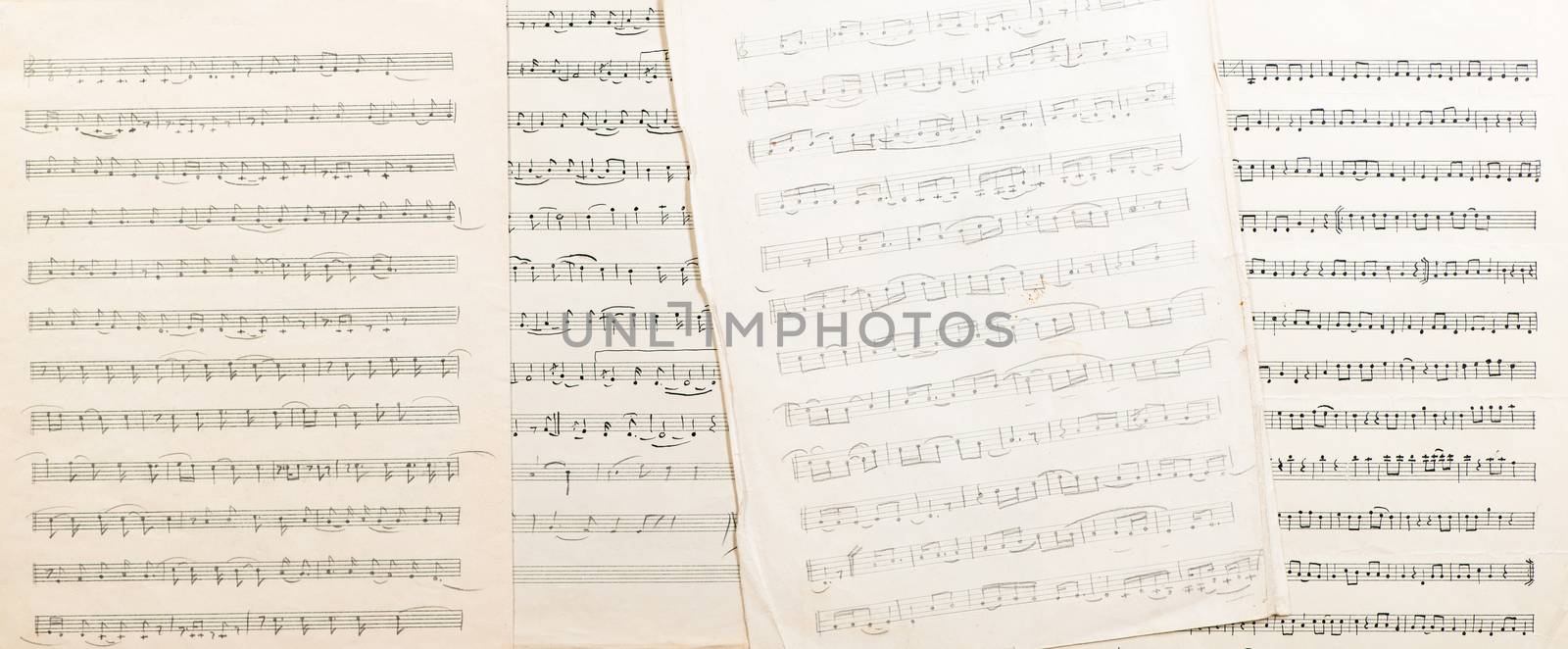 Tashkent, Uzbekistan - October 6, 2018. The work of the Uzbek folk composer Yunus Rajabi. Vintage sheet of paper with handwritten musical notes.