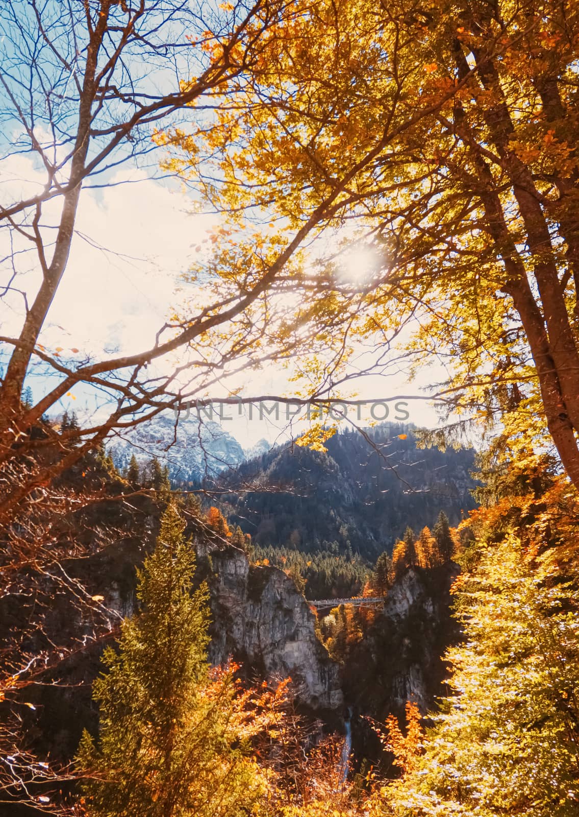 Beautiful nature of European Alps, landscape view of alpine mountains, lake and village in autumn season, travel and destination by Anneleven