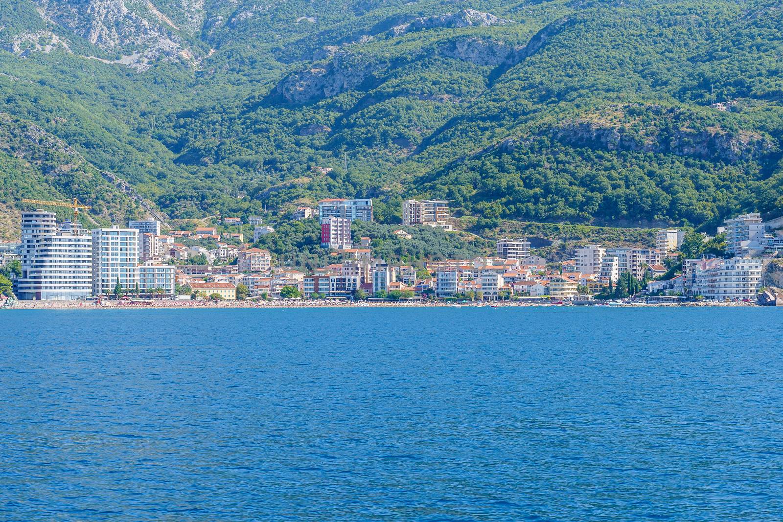 Budva Riviera in Montenegro, view from the sea on a sunny summer day