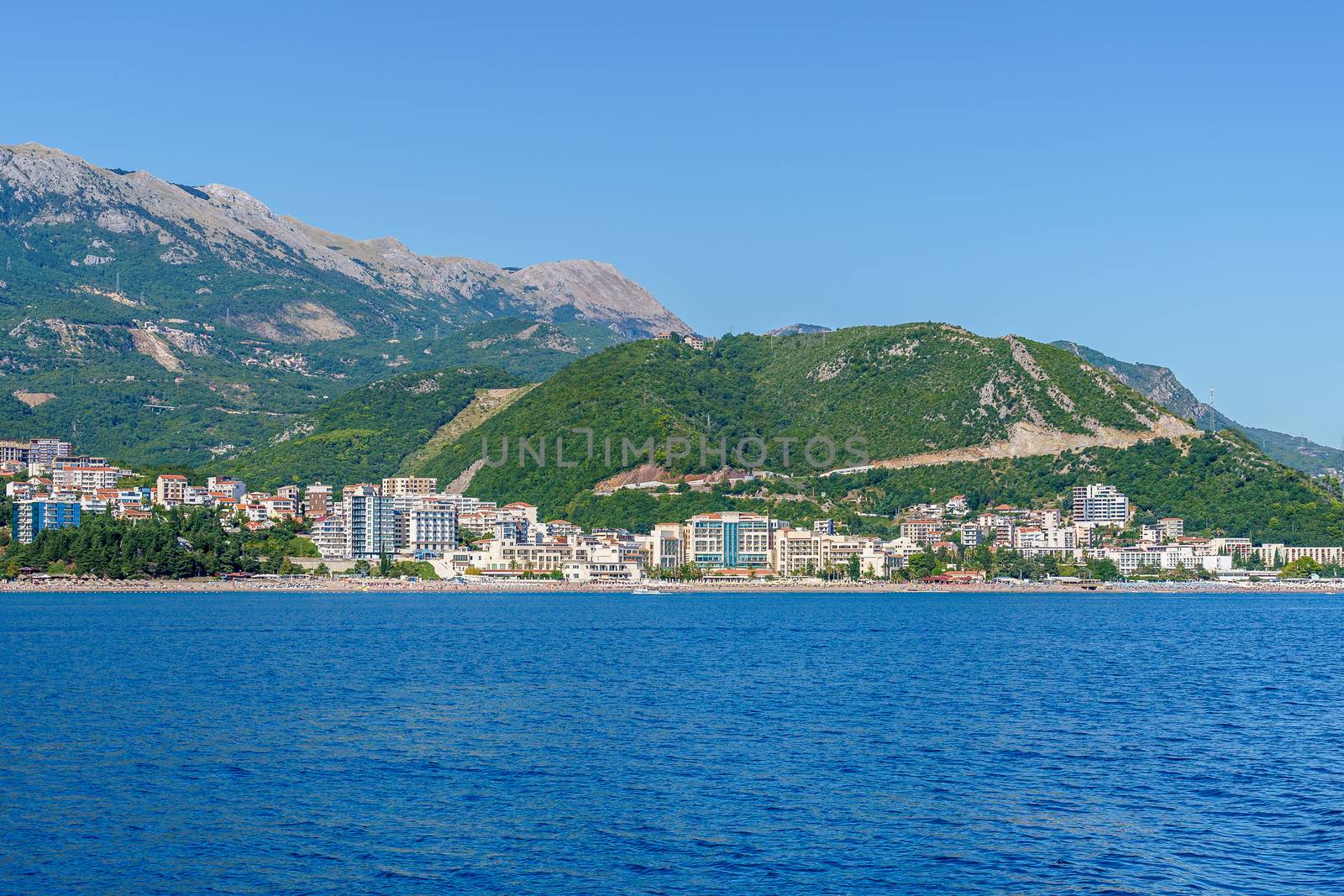 Budva Riviera in Montenegro, view from the sea on a sunny summer day