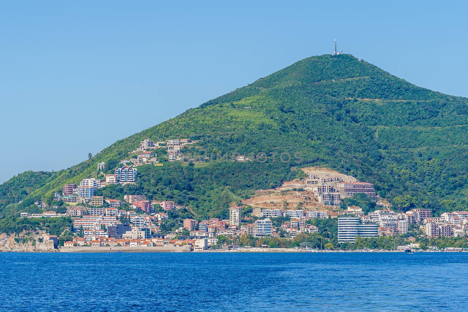 Budva Riviera in Montenegro, view from the sea on a sunny summer day