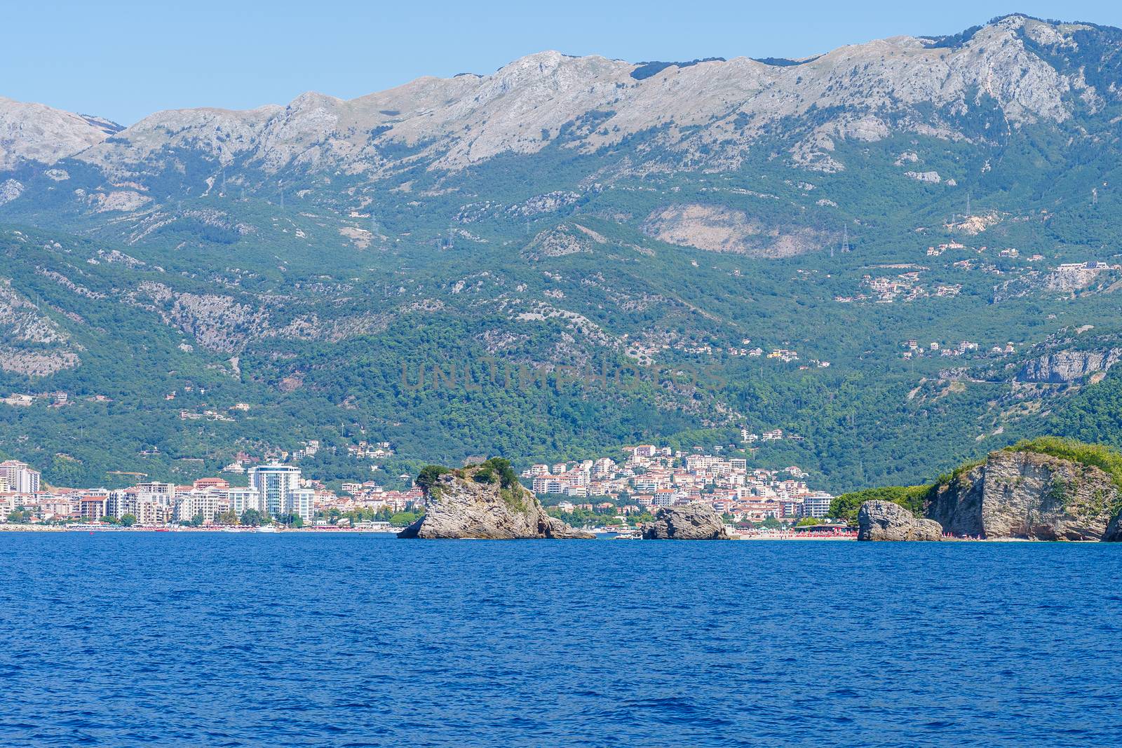 Budva Riviera in Montenegro, view from the sea on a sunny summer day