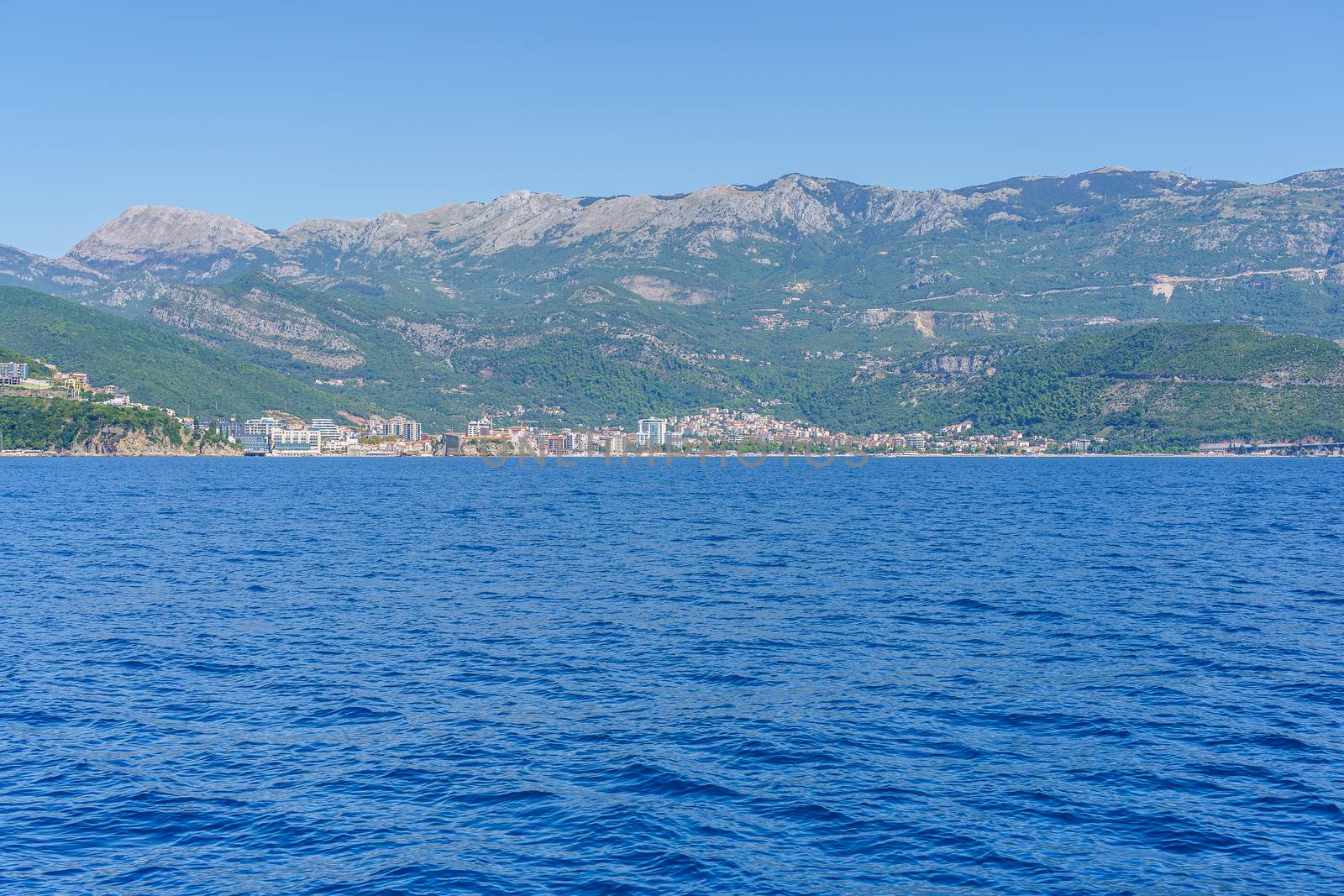 Budva Riviera in Montenegro, view from the sea on a sunny summer day