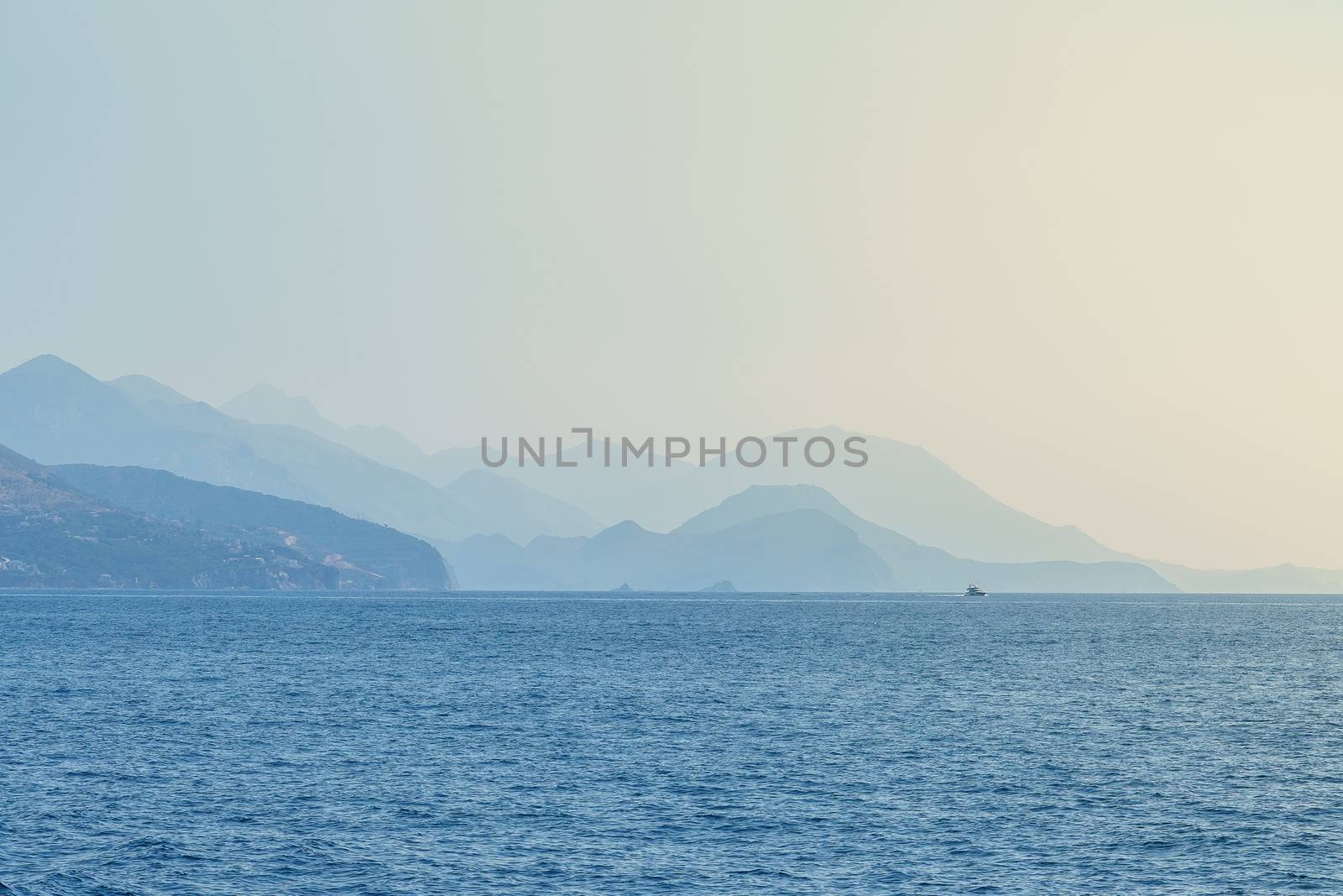 Budva Riviera in Montenegro, view from the sea on a sunny summer day