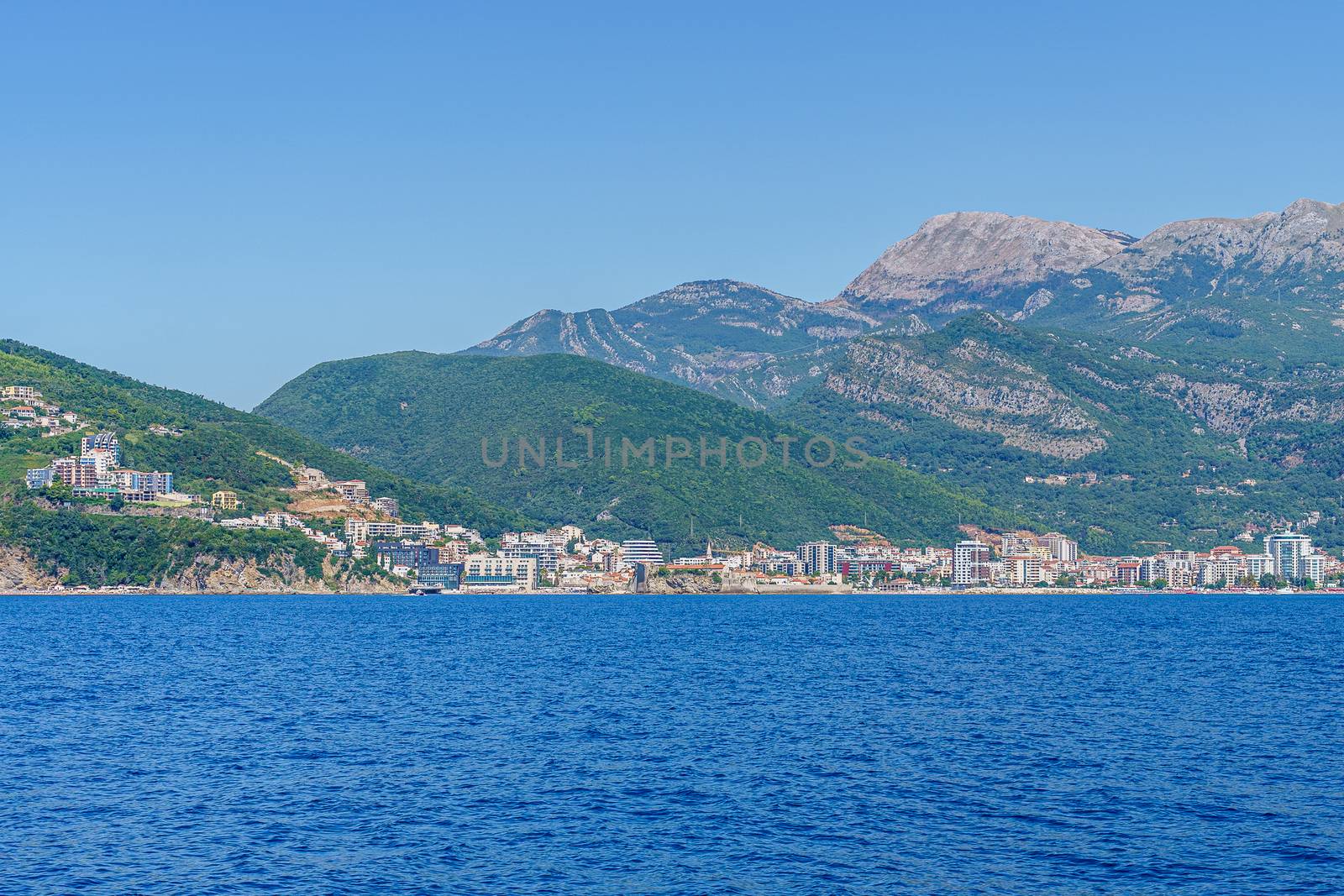 Budva Riviera in Montenegro, view from the sea on a sunny summer day