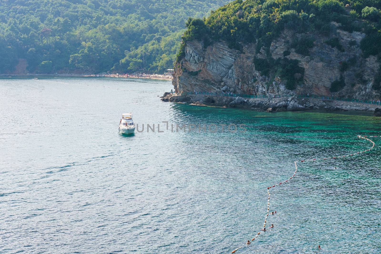 Budva Riviera in Montenegro, view from the sea on a sunny summer day