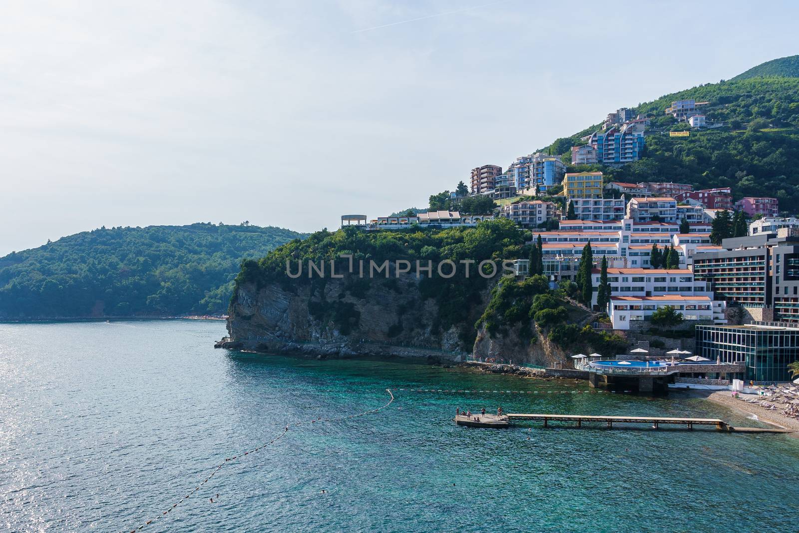 Budva Riviera in Montenegro, view from the sea on a sunny summer day