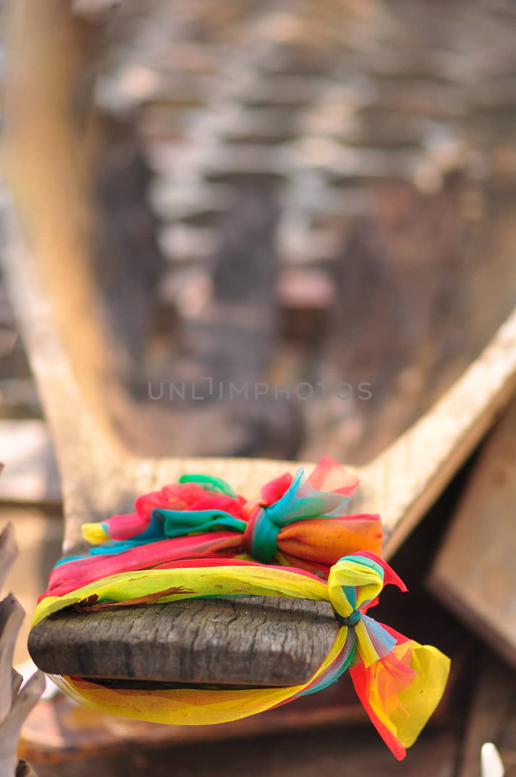 The three-color fabric was tied to the prow, Is a belief in Thailand about guardian goddess of boats.