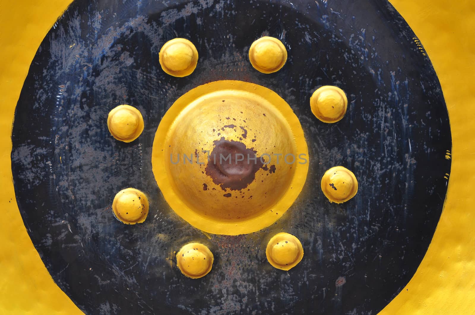 A close-up shot of a large Thai gong, which is an ancient Thai musical instrument.