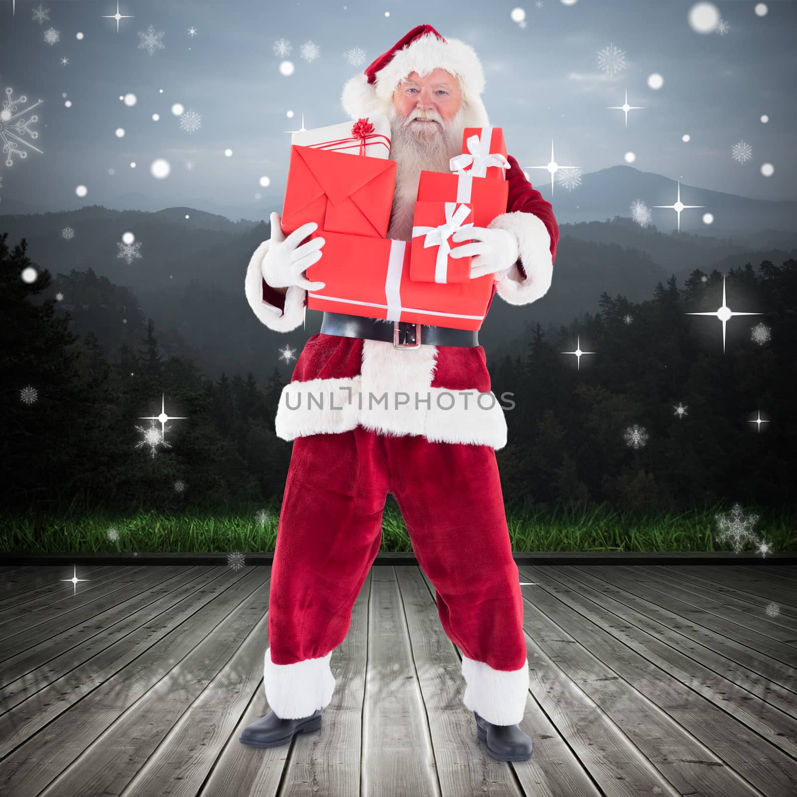 Composite image of santa carrying gifts by Wavebreakmedia