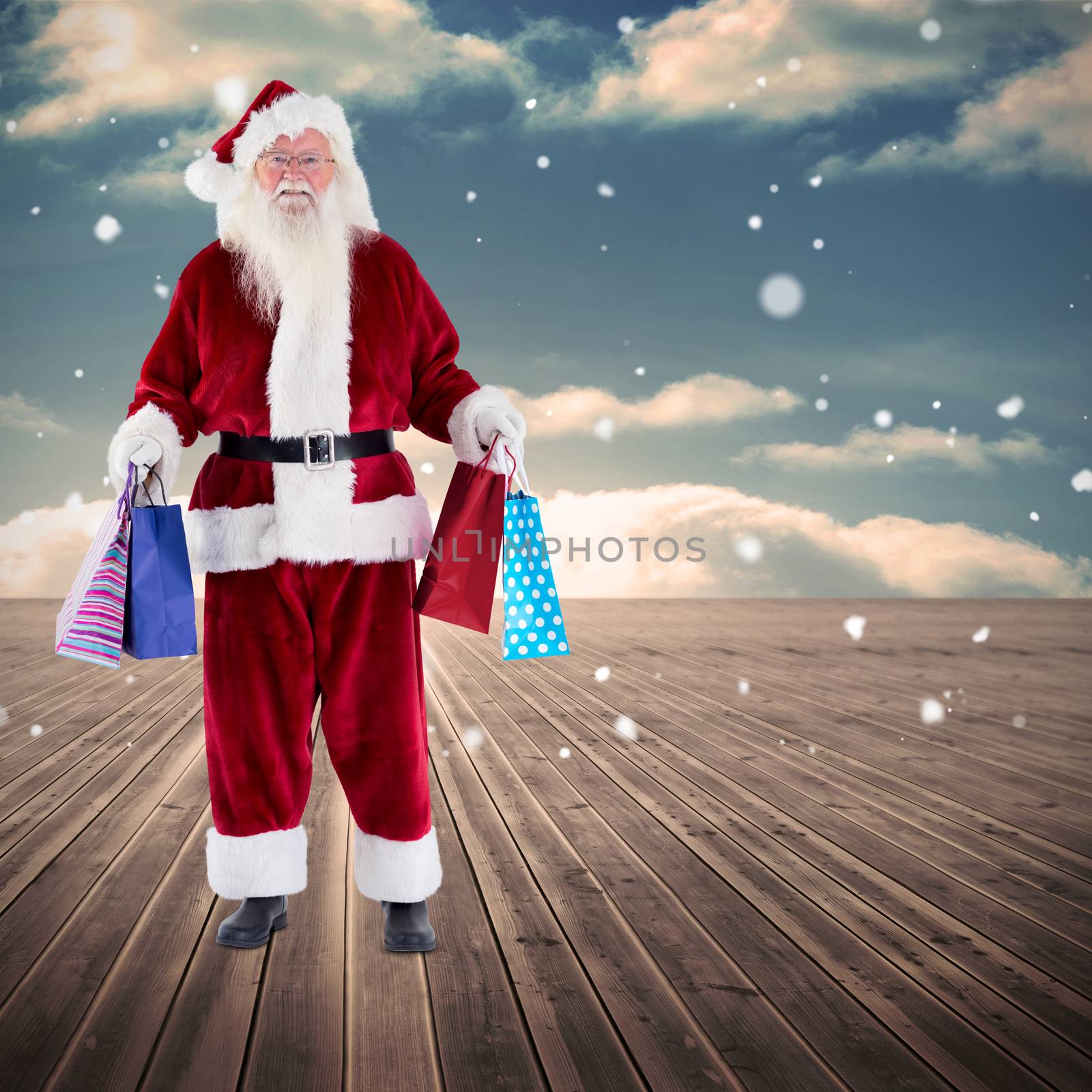 Santa carrying gifts against wooden planks leading to blue sky