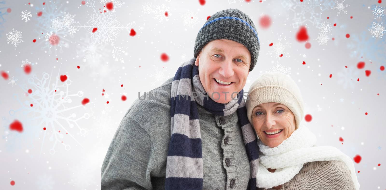 Composite image of mature winter couple by Wavebreakmedia
