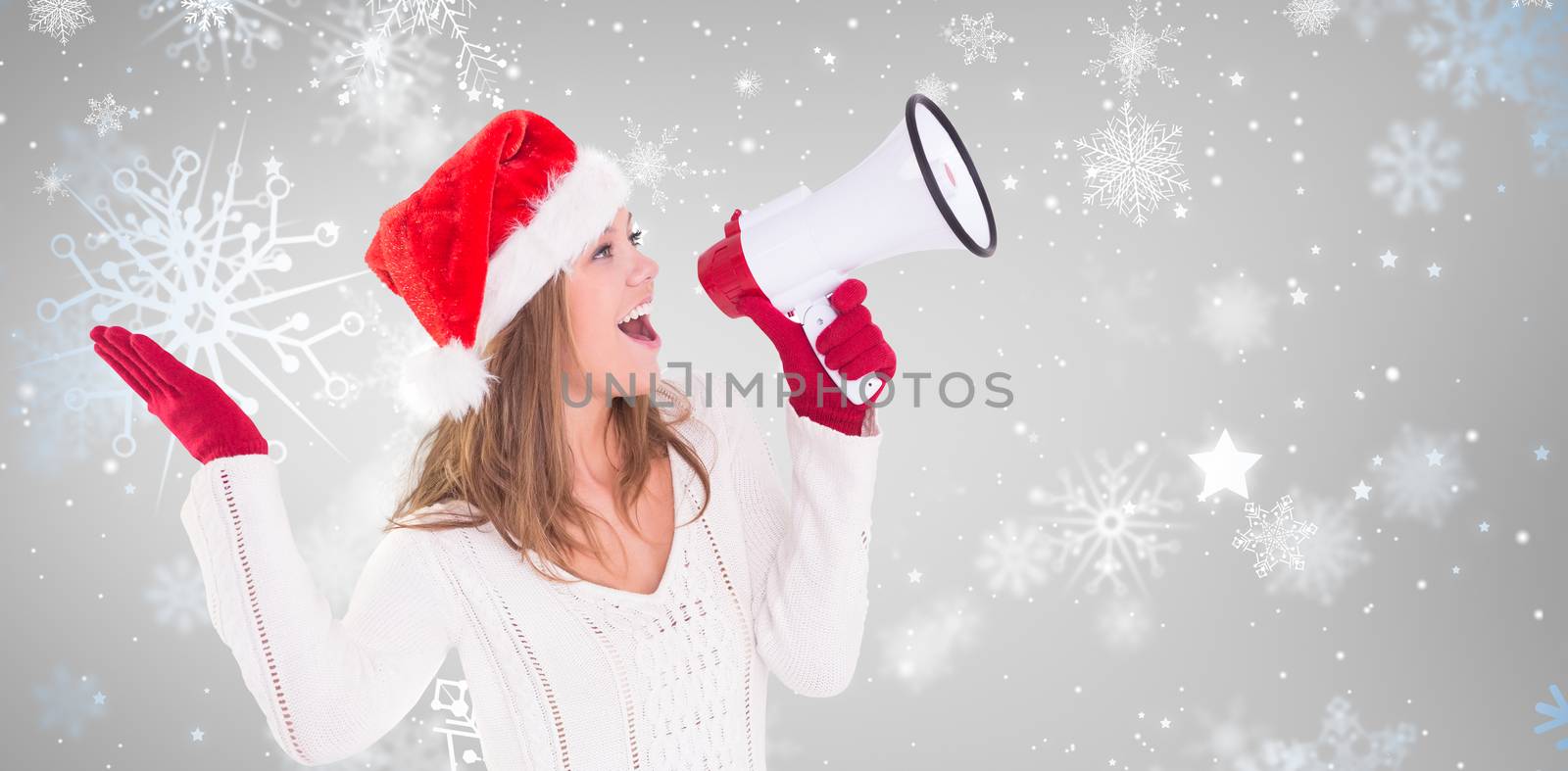 Festive blonde shouting through megaphone against snowflake pattern