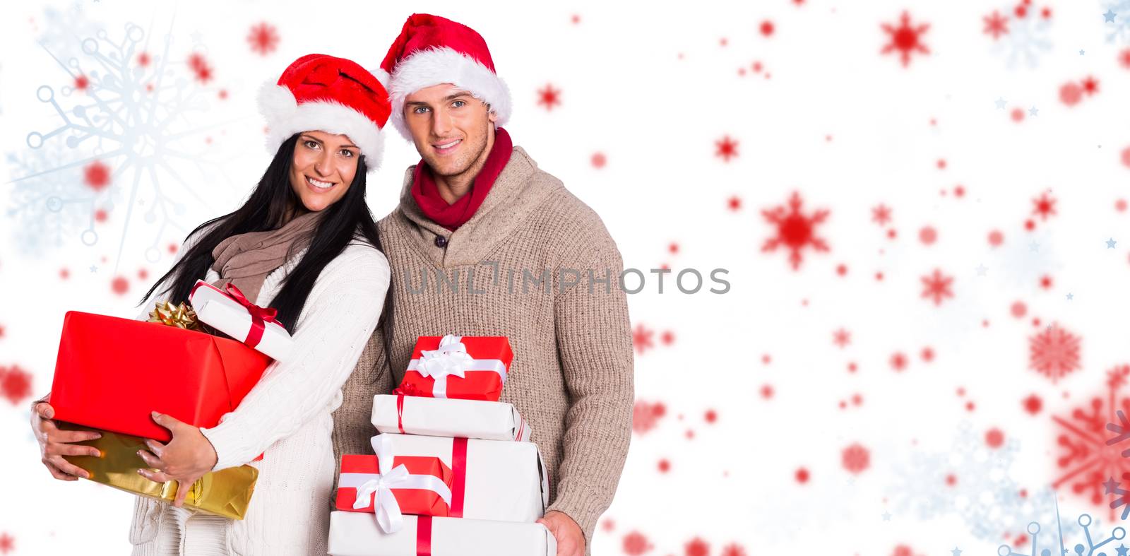 Composite image of young couple with many christmas presents by Wavebreakmedia